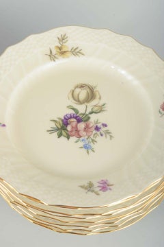12 Royal Copenhagen Frijsenborg plates in porcelain.