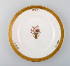 12 Royal Copenhagen „Goldener Korb“-Essteller mit Goldkante