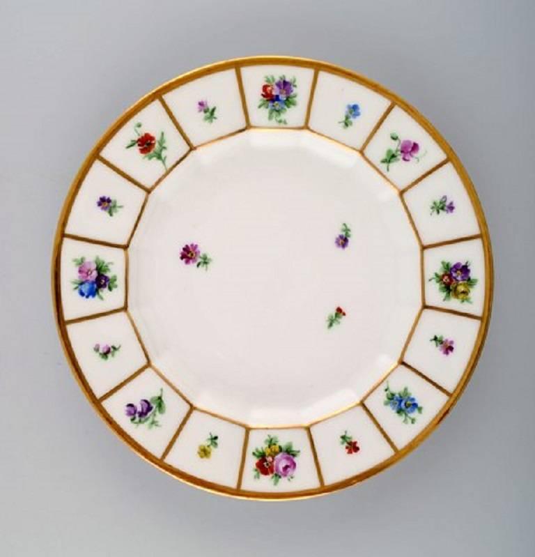 12 Royal Copenhagen Henriette. Hand-painted porcelain. 
Henriette lunch plates no. 444/8550.
Measures: Diameter 22 cm. 
In perfect condition.
1st. factory quality.