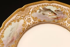 12 Royal Doulton Hand Painted and Heavily Gilded Fish Plates