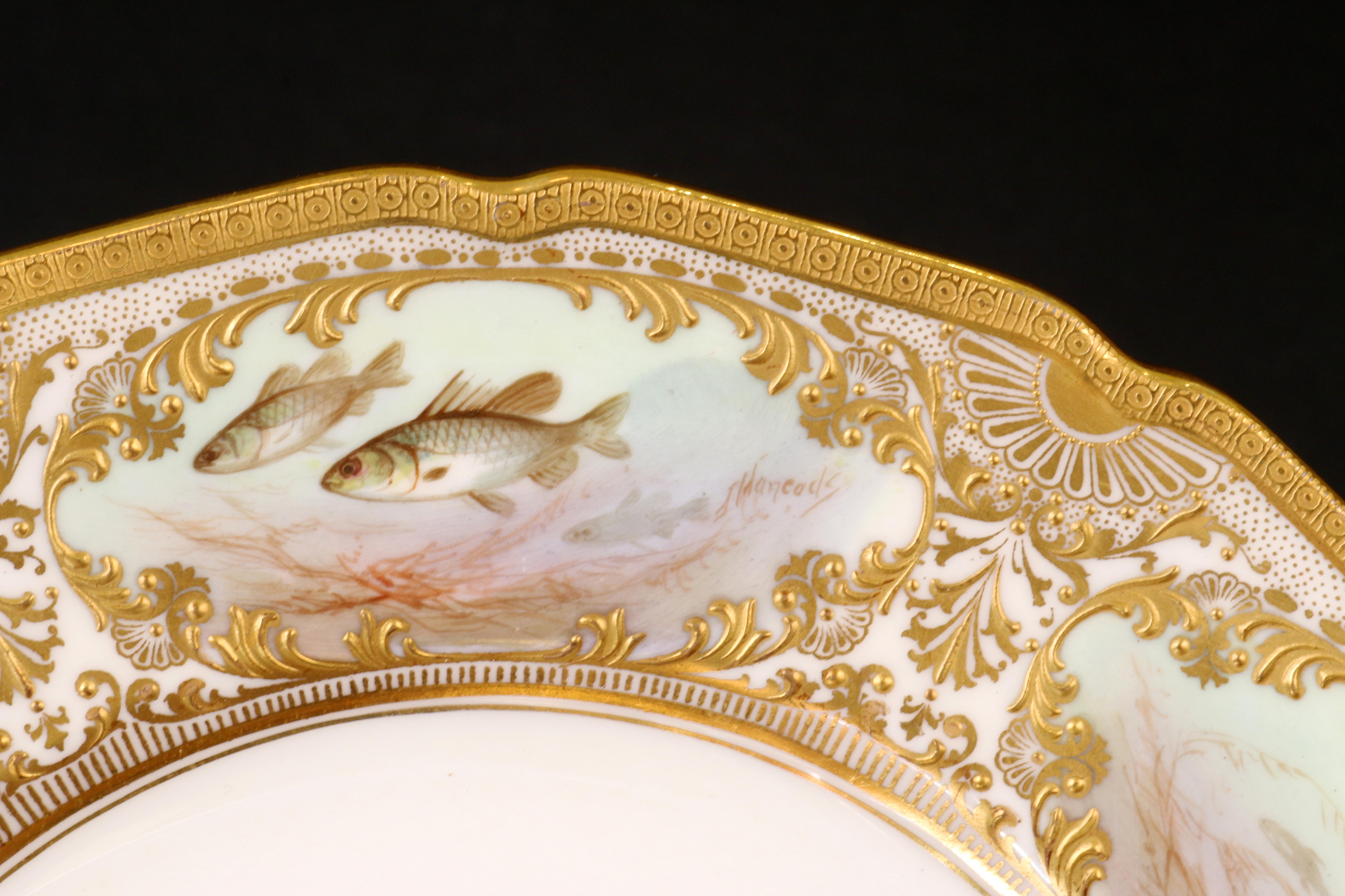 English 12 Royal Doulton Hand Painted and Heavily Gilded Fish Plates For Sale