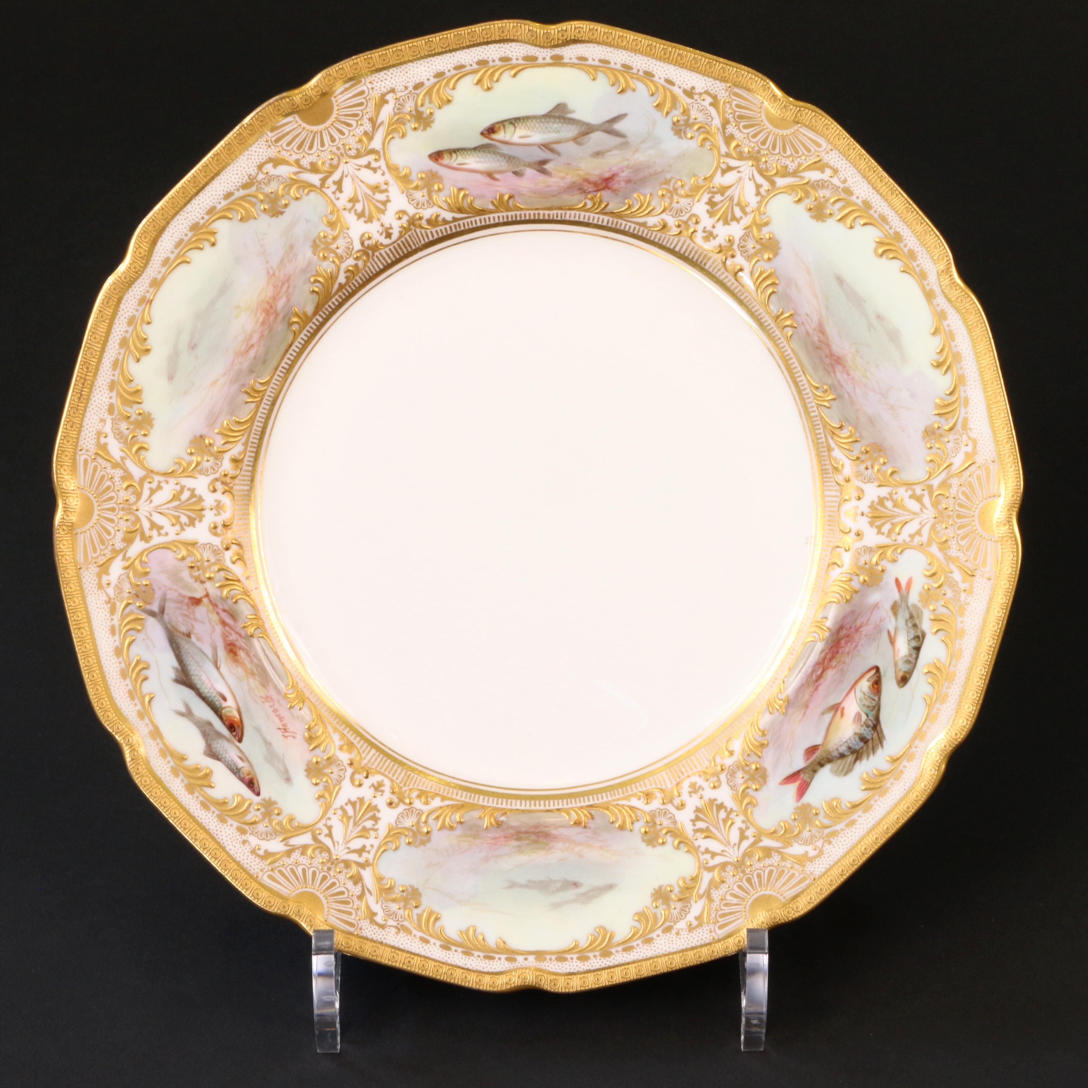 12 Royal Doulton Hand Painted and Heavily Gilded Fish Plates In Excellent Condition For Sale In New York, NY