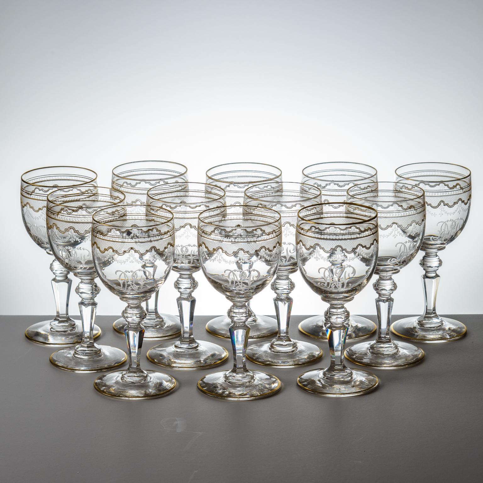 Early 20th Century 12 Saint Louis Gilt Decorated Wine Glasses With Cut Knob Stems, Antique For Sale