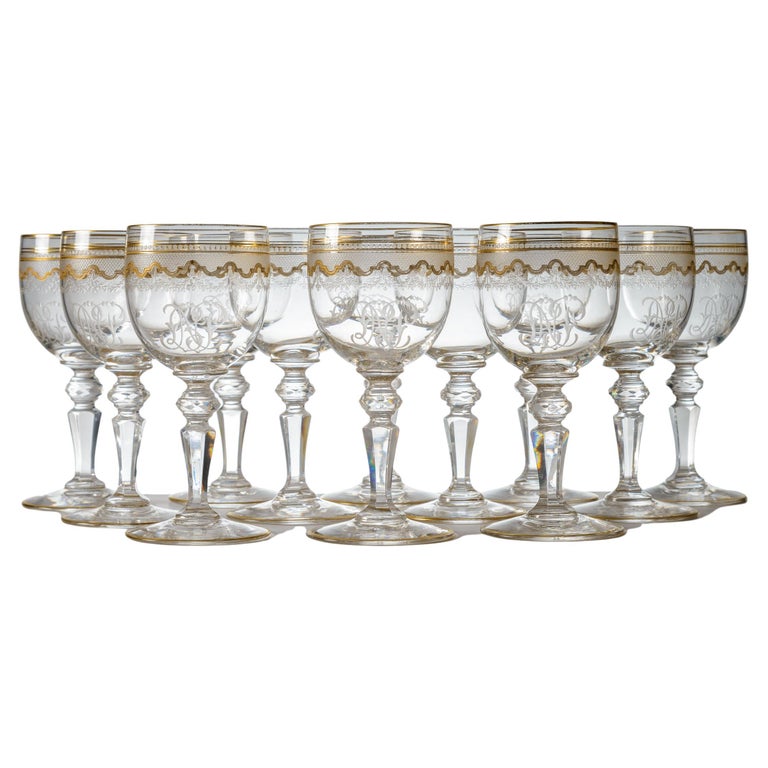 https://a.1stdibscdn.com/12-saint-louis-gilt-decorated-wine-glasses-with-cut-knob-stems-antique-for-sale/f_17272/f_347086921686428706537/f_34708692_1686428707301_bg_processed.jpg?width=768