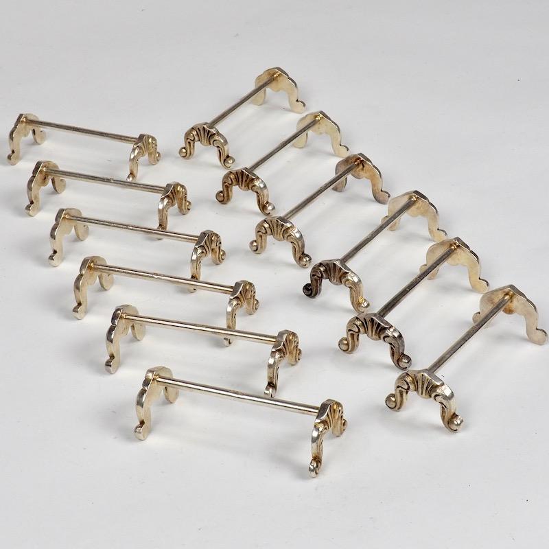 12 Spanish Hallmarked Silver Knife Rests with Scolloped Cabriole Feet In Good Condition In CA, CA