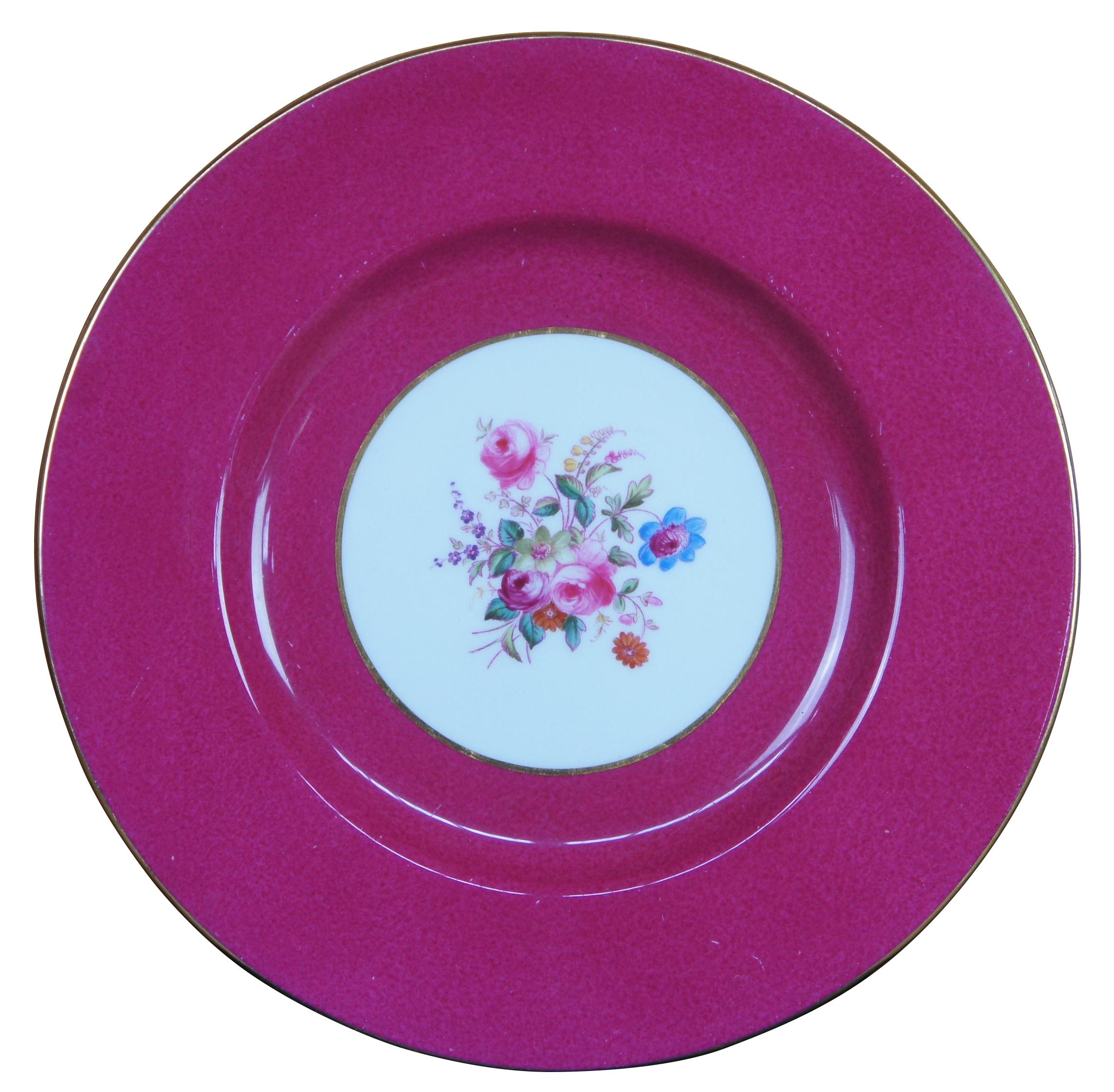 Set of 12 Spode Copeland’s China salad plates in pattern R9282 with a dark magenta pink border around a floral bouquet. Measure: 9