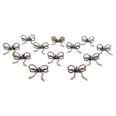 12 Sterling silver bow-shaped place-card holders