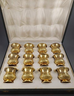 12 jarrones de plata de ley dorada