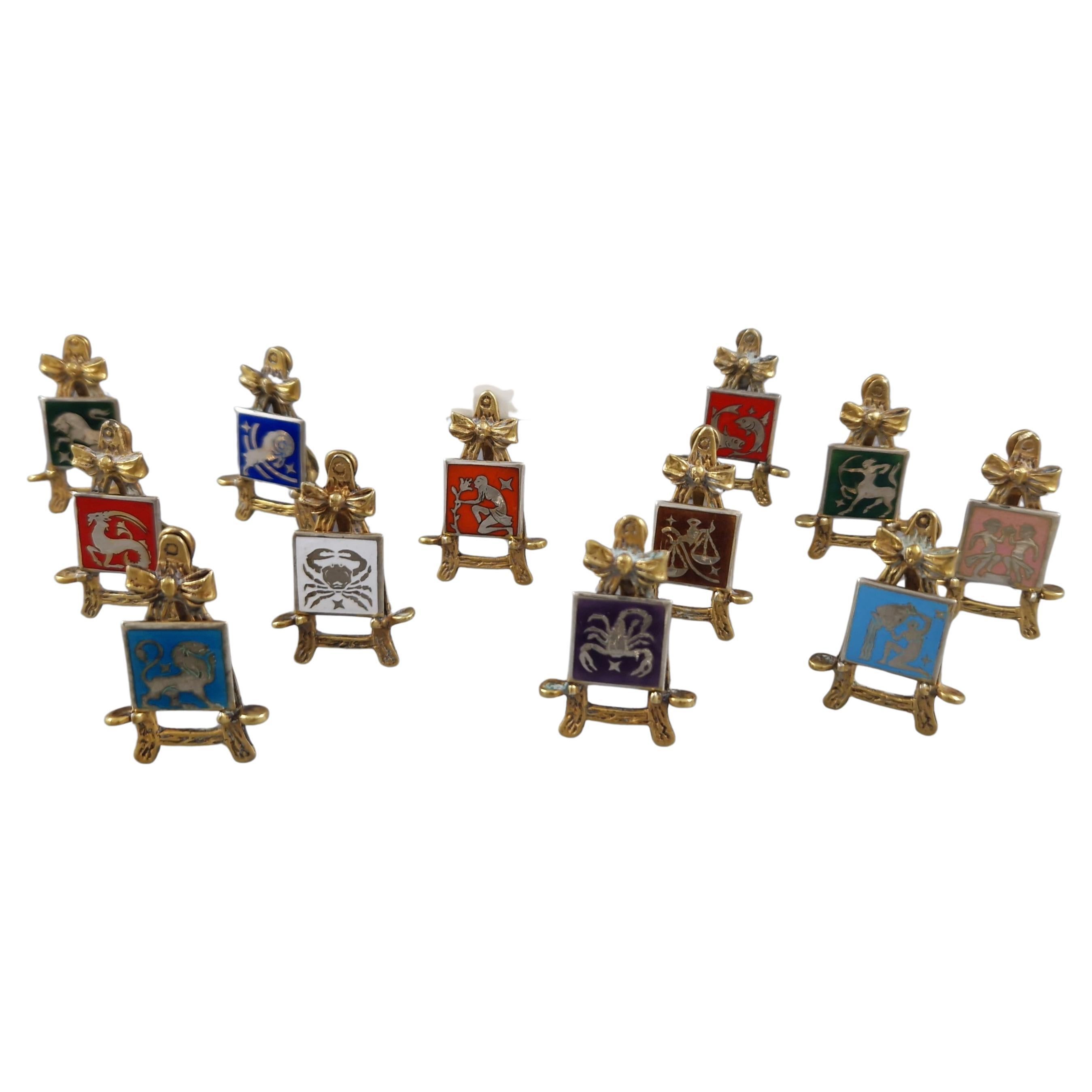12 Sterling Silver gilt and enamel zodiac signs place card holders