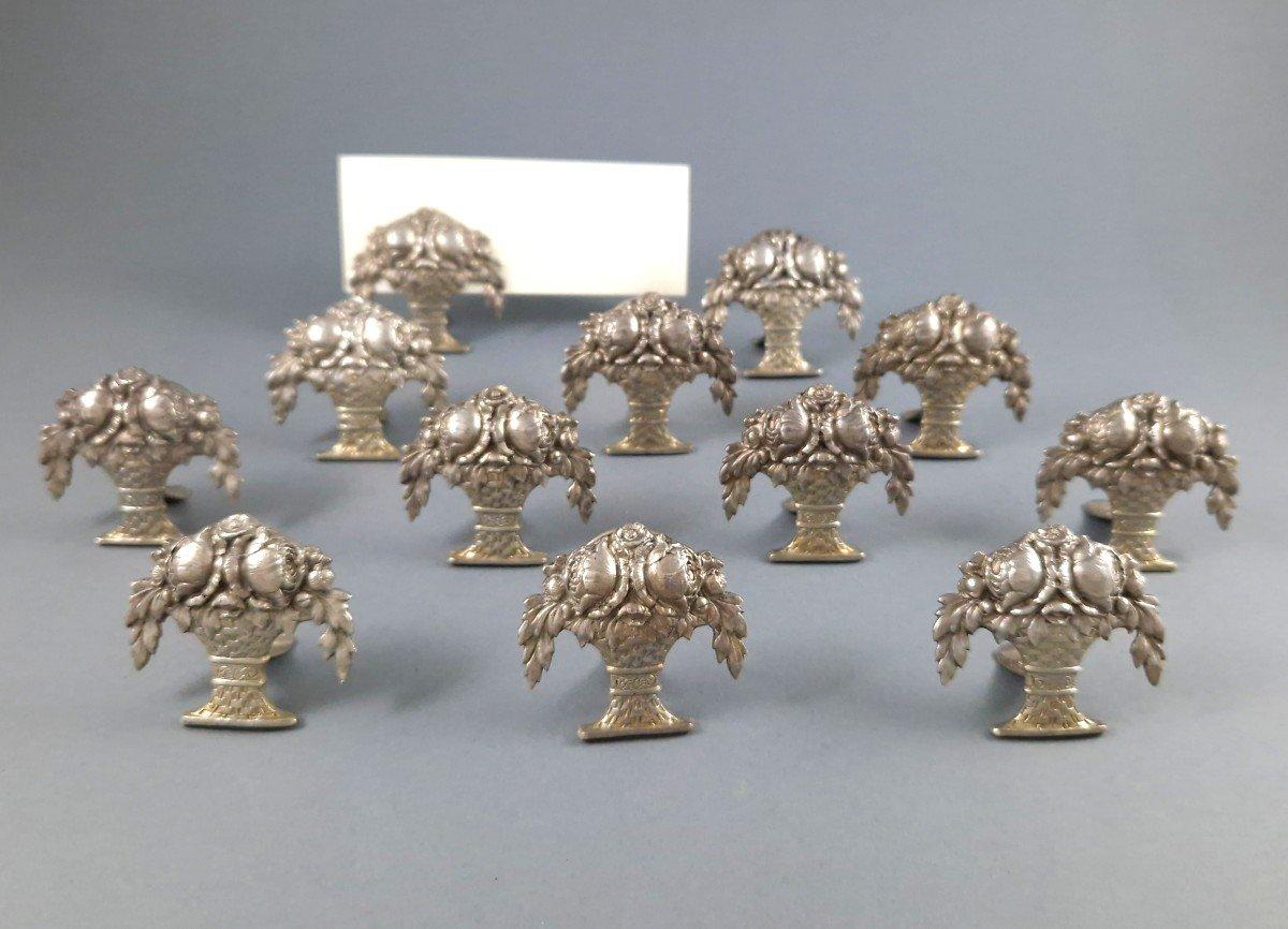 Set of twelve Sterling Silver Place Card Holders depicting a bouquet of flowers
800 silver hallmark
1920's German work
