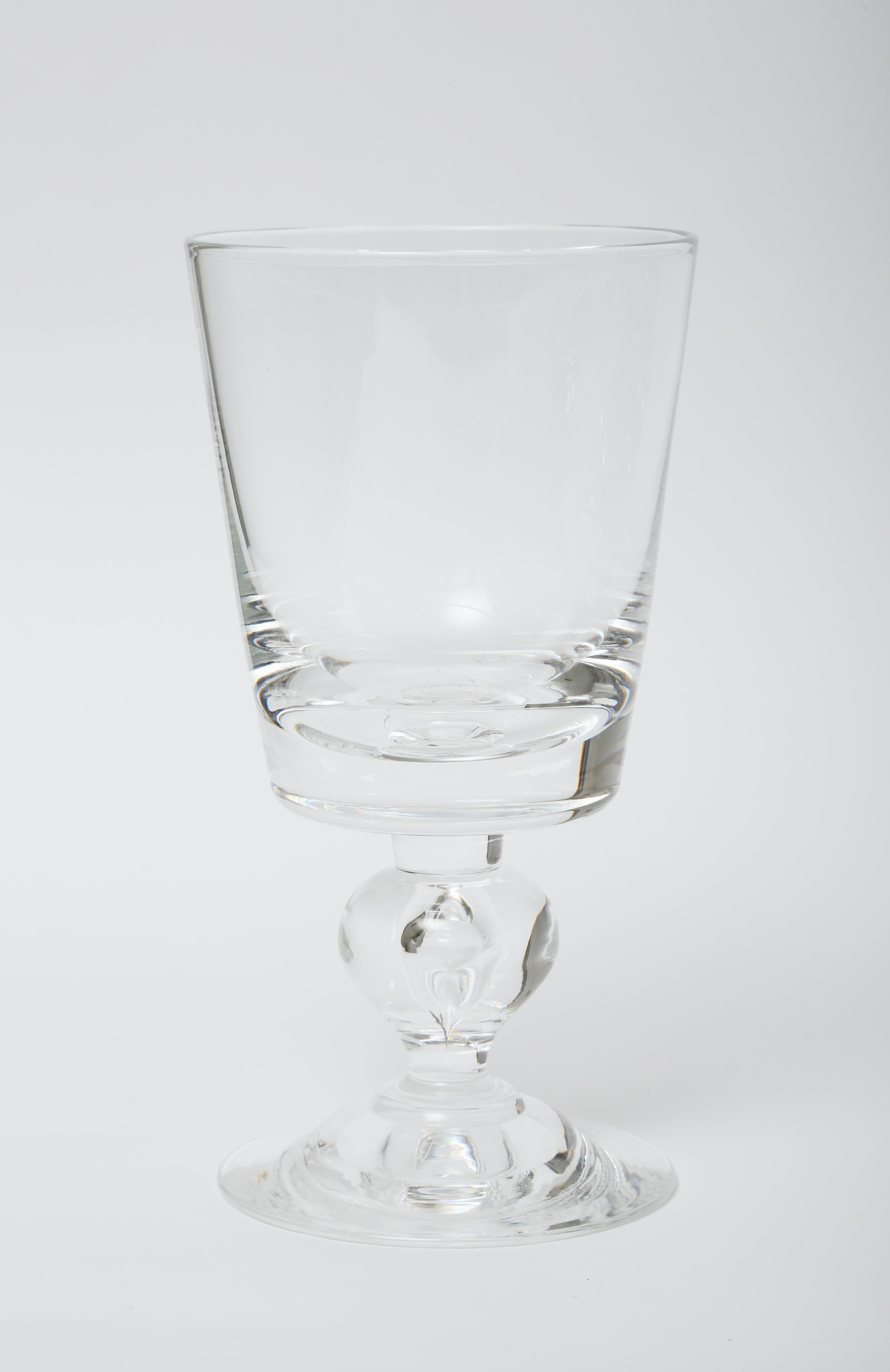 From one of America's leading Corning New York Glass manufacturers is this wonderful set of 12 very heavy weight goblets. Almost 2 pounds each glass, with a tapered design for stability and crystal clear quality for viewing. Now that we no longer