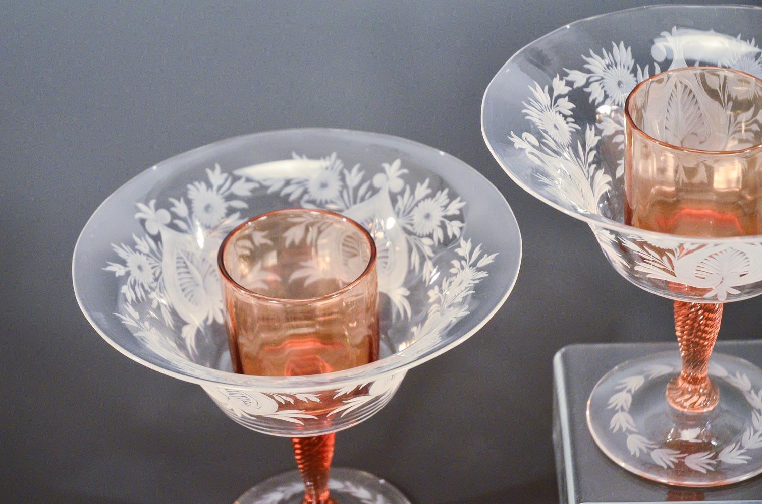 This amazing and rare set of 12 hand blown crystal large compotes beautifully exemplifies Steuben's famous combination of 