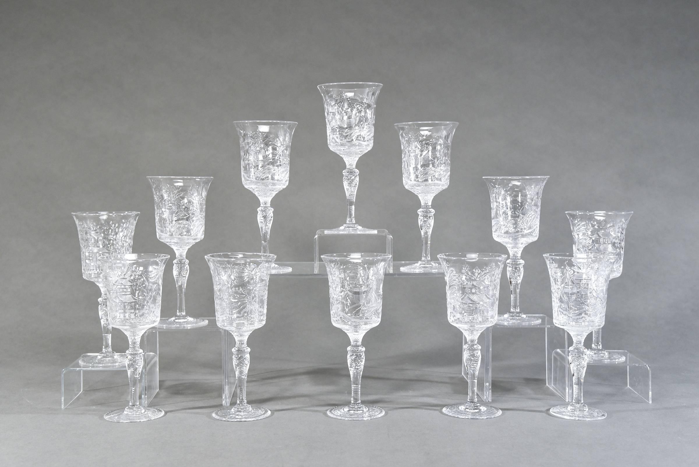 This is a rare set of 12 hand blown water goblets made by Stevens and Williams, England, circa 1910. The 8