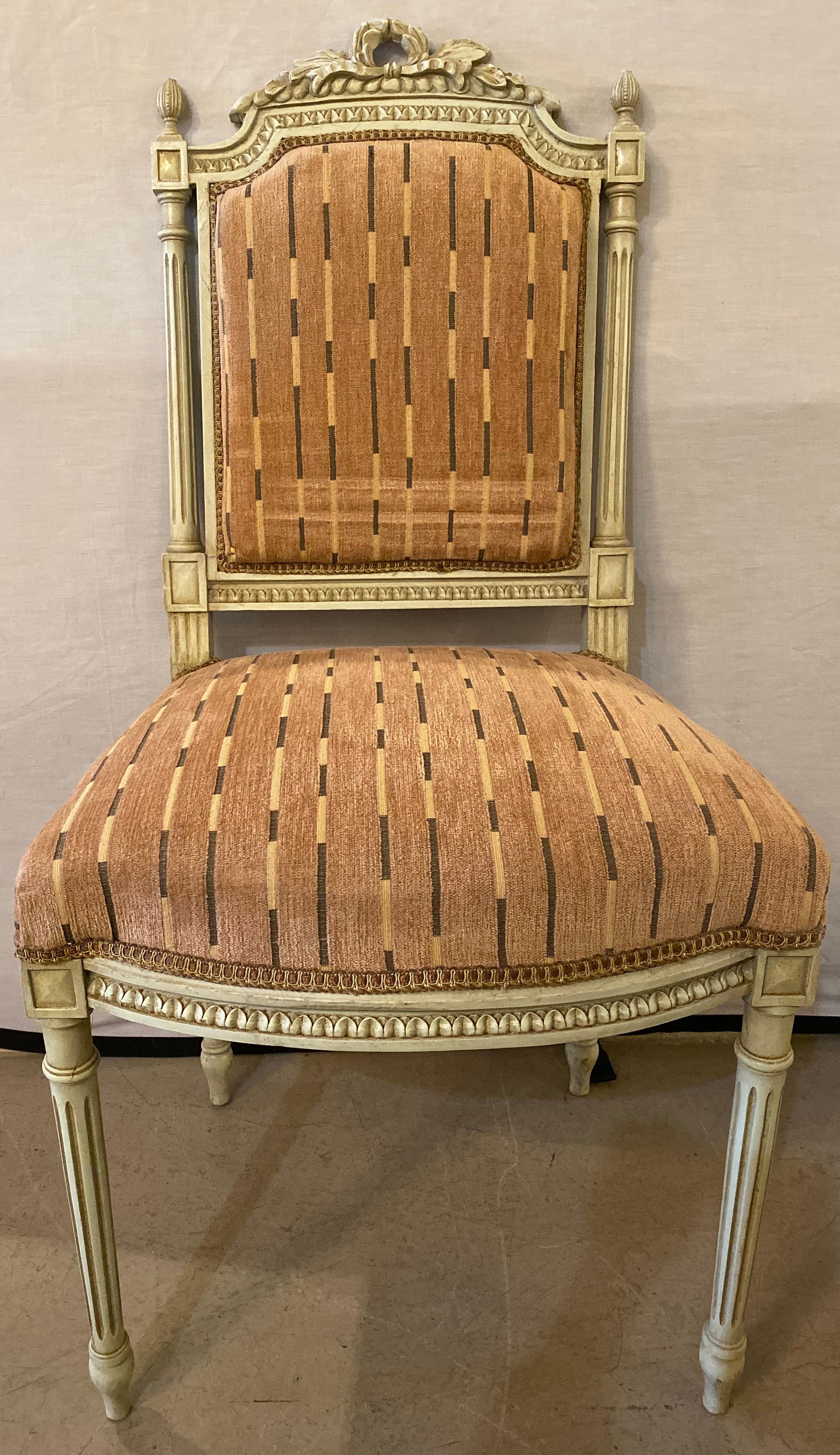 10 Swedish Louis XVI Style dining / side chairs painted carved frames new fabric. Each stripped rose colored newly upholstered and refinished dining chair is finely carved with tapering legs supporting a square padded seat rest with carved apron.