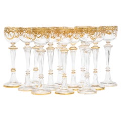 12 Tall Elegant Raised Gilt Encrusted Antique Wine Glasses. Circa 1880's