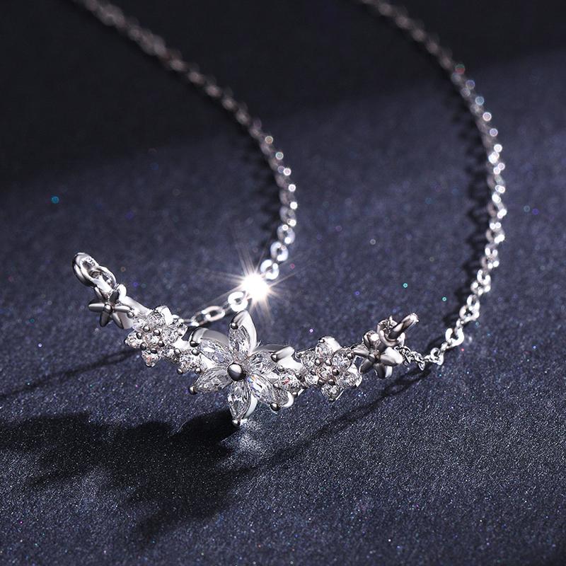 Elevate your style with our Marquise Diamond Flower Design Necklace, a stunning piece of artistry meticulously crafted in lustrous 14-karat white gold. This necklace encapsulates the essence of elegance and grace with its exquisite design.

At the