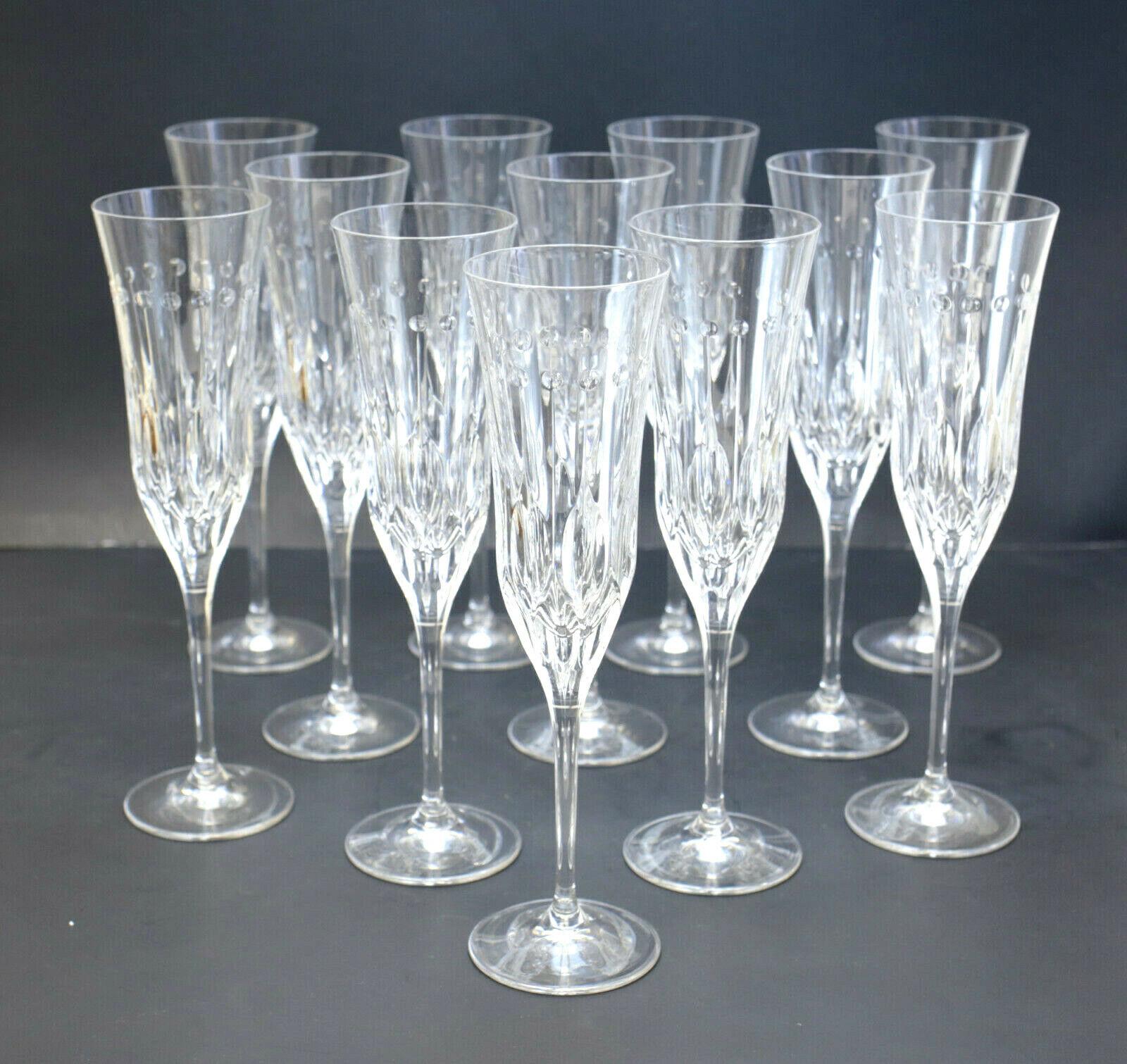 12 Varga Contemporary Cut Glass Clear Fluted Champagne Flutes in Renaissance

Modernist dots and vertical stripes to the bowl of the goblets. Incised 
