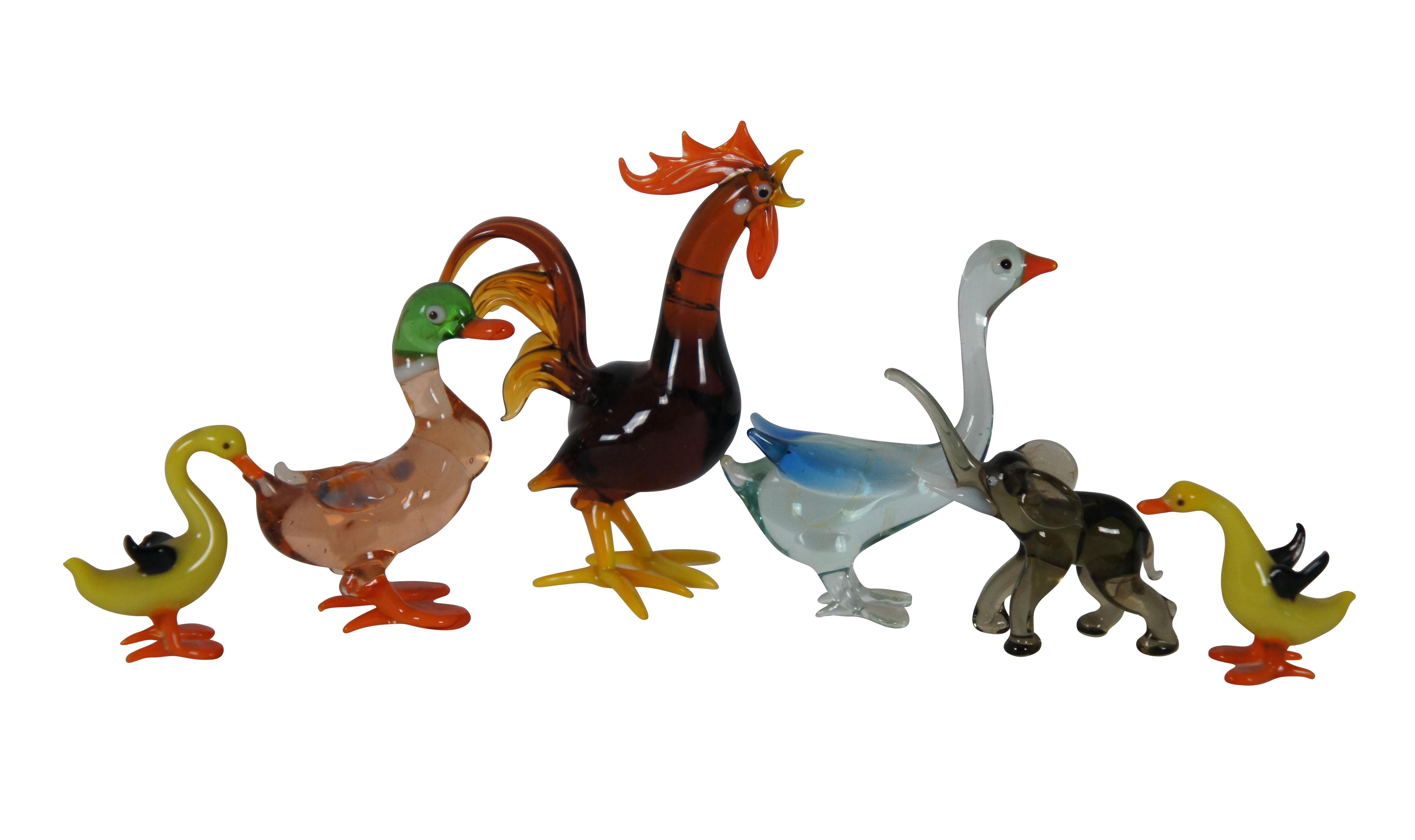 Vintage lot of twelve farmhouse ornament / figurine animals, hand blown in various colors and designs.  Includes Rooster, Chicken, Geese / Goose, Rabbit, Seal / Sea Lion, Dove, Ducks, and Elephant.

Dimensions:
Largest - 2.5” x 1.25” x 3” / Smallest
