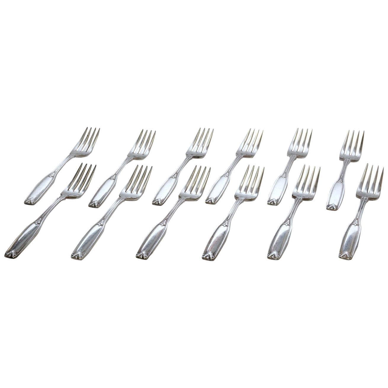 12 fourchettes à dîner vintage en métal argenté d'hôtel par Oneida en vente
