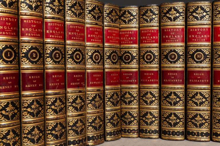 12 Volumes. James Anthony Froude. History of England from the Fall of Wolsey to the Death of Elizabeth. Bound in full blue calf by Zaehnsdorf. marbled endpapers, inner dentelles, gilt on spines and covers, red labels, marbled edges, raised bands.