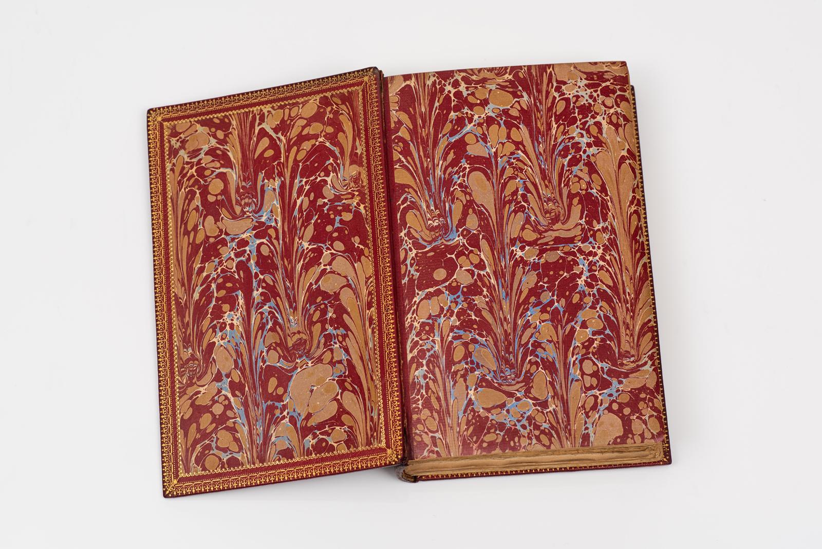 12 Volumes. Lord Macaulay, History of England. Albany Edition. Limited to 250 copies of which this is 218. Bound in full red morocco with gilt tooling on the covers and raised band spine. Top edges gilt. Marbled endpapers with dentelles. Portrait
