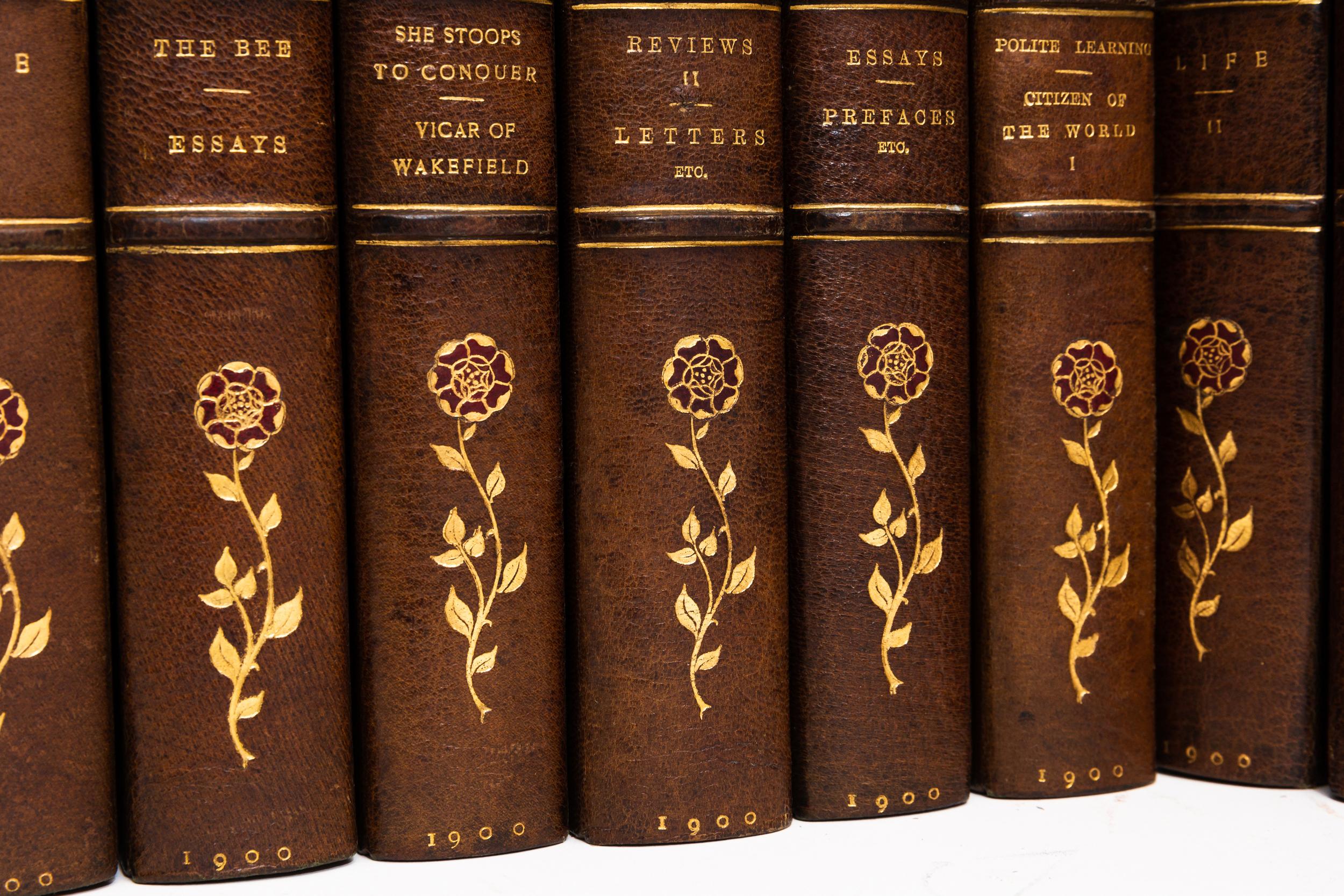 12 Volumes. Oliver Goldsmith, The Works of Oliver Goldsmith. Bound in 3/4 green morocco. Marbled boards. Raised bands. Top edges gilt. Floral gilt symbols on spines. Marbled endpapers. Illustrated. Library Edition. Published: New York; Harper &