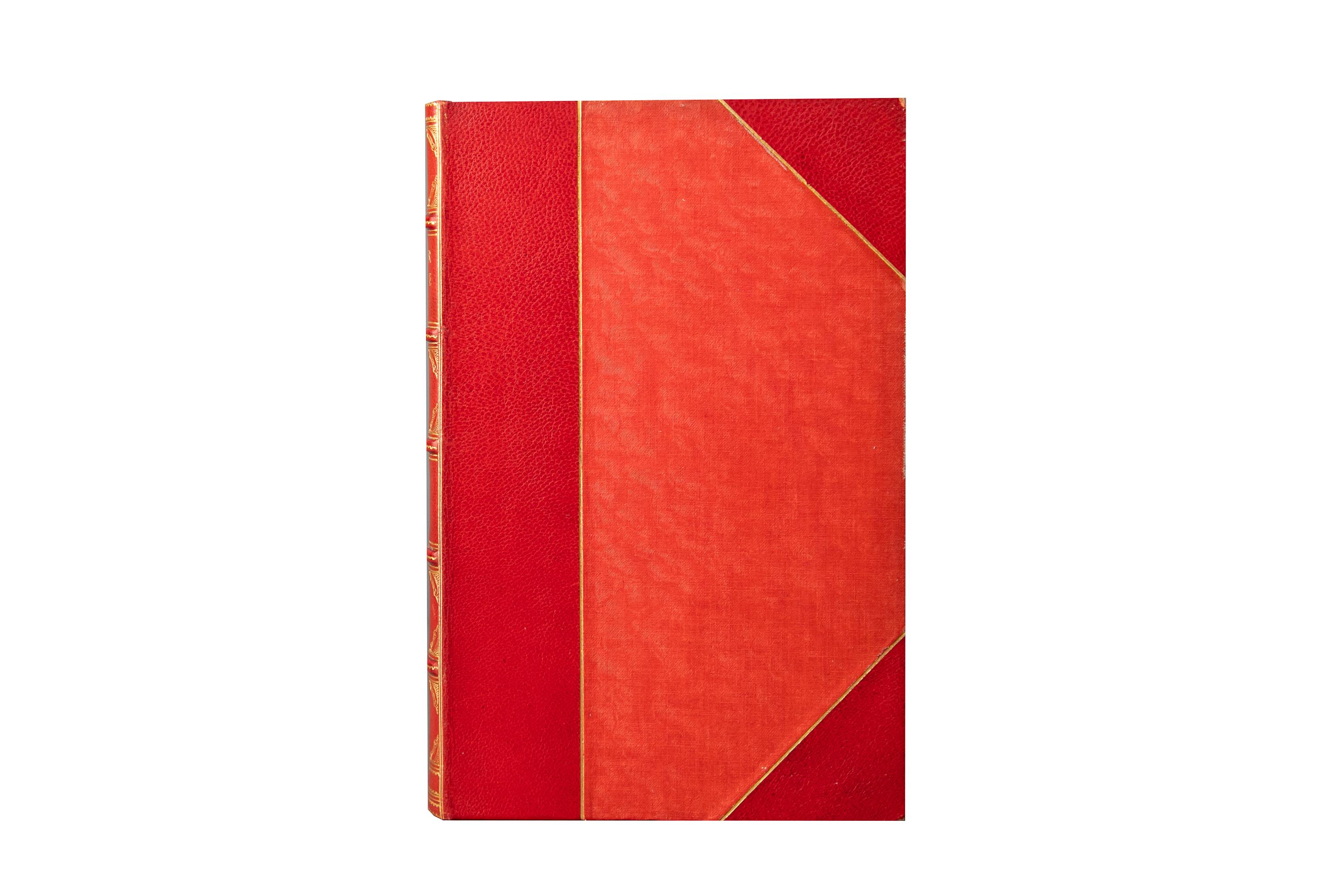12 Volumes. Oscar Wilde, The Writings. Large Paper Edition. Bound in 3/4 red morocco and silk boards, bordered in gilt-tooling. The spines display raised bands, bordering, panel details, and label lettering, all gilt-tooled. The top edges are gilded