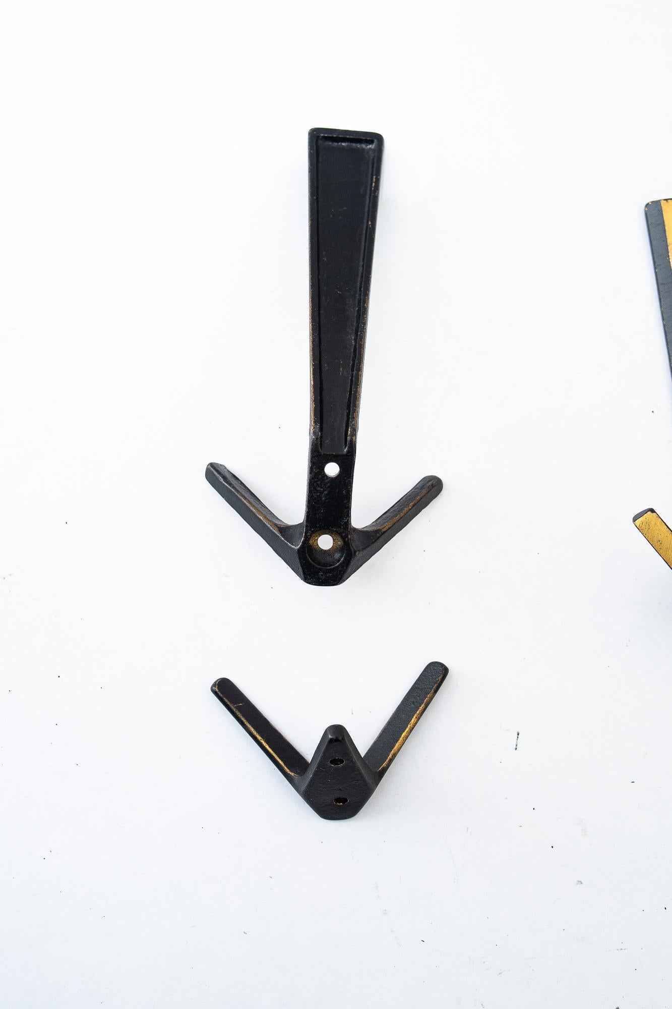 Blackened 12 Wall Hooks by Herta Baller, around 1950s For Sale