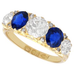 Zafiro basáltico de 1,20 quilates Diamante de 1,59 quilates, Anillo de cinco piedras de oro amarillo de 18 quilates