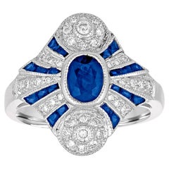 Bague en or avec saphir bleu de 1,20 carat et diamants