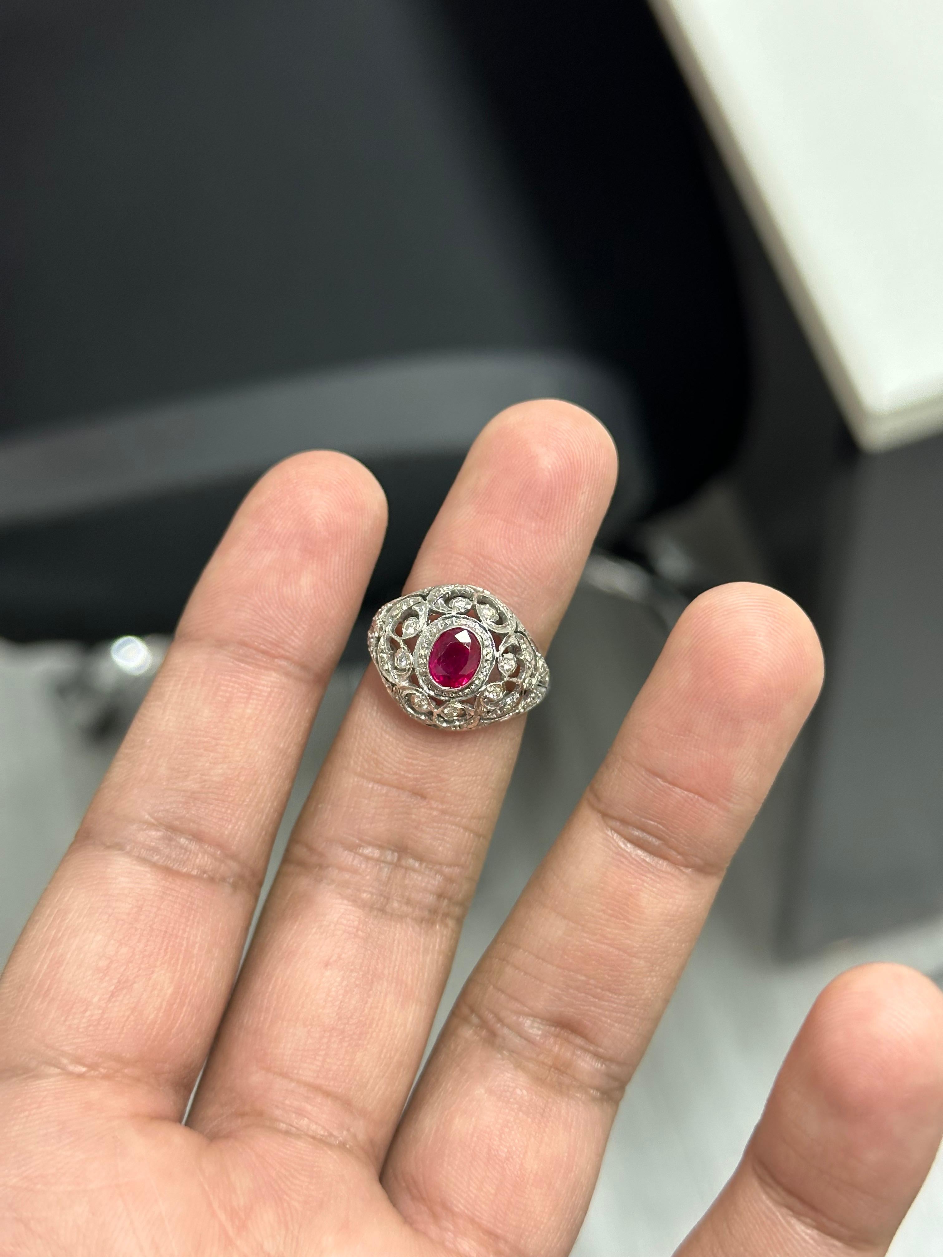 A timeless expression of elegance and passion, this exquisite ring features a natural heated Burmese ruby, celebrated for its intensely saturated red hue and historical prestige. Carefully selected for its vivid color and refined clarity, the ruby