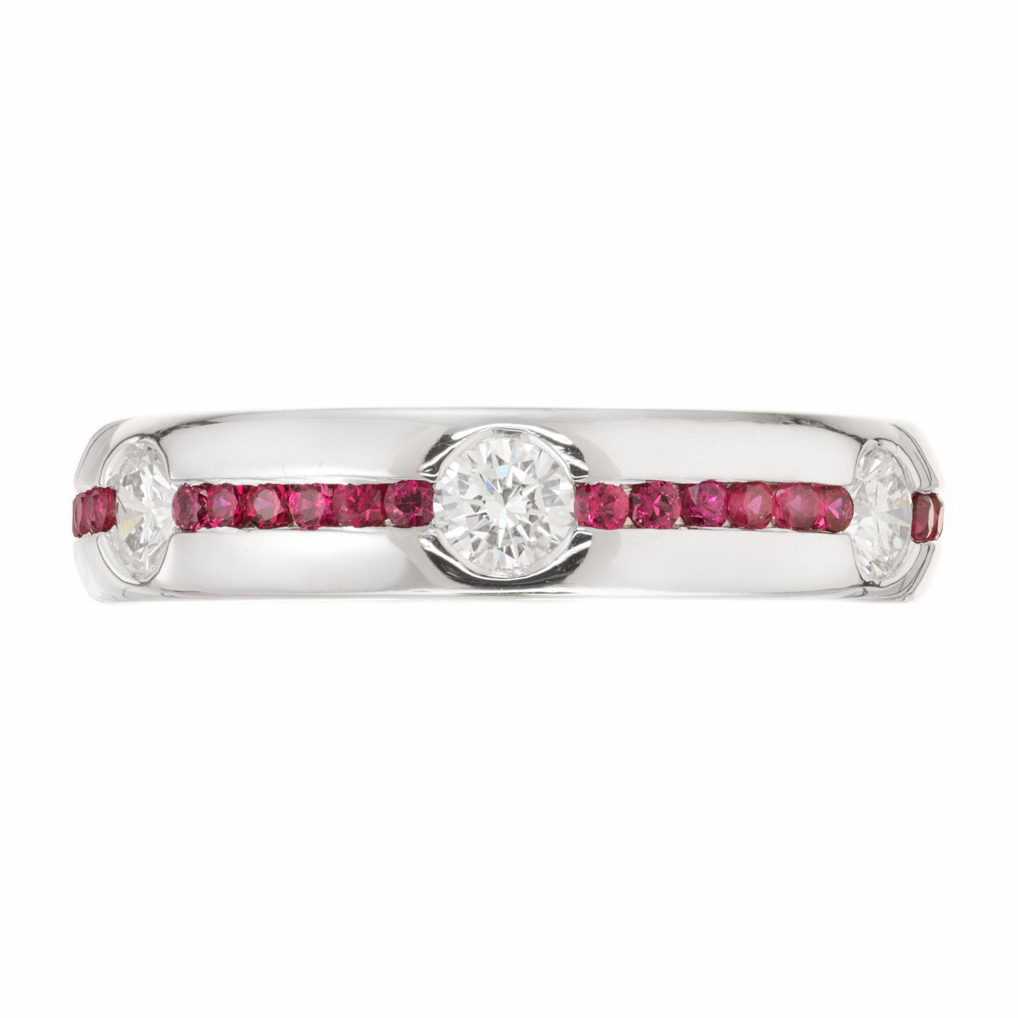 Diamond and ruby wedding band ring. 6 round full cut diamonds set in a platinum band setting with 36 round rubies.

6 Ideal full cut diamonds, approx. total weight .60cts, F, VS1
36 genuine round bright red Rubies, approx. total weight .60cts,