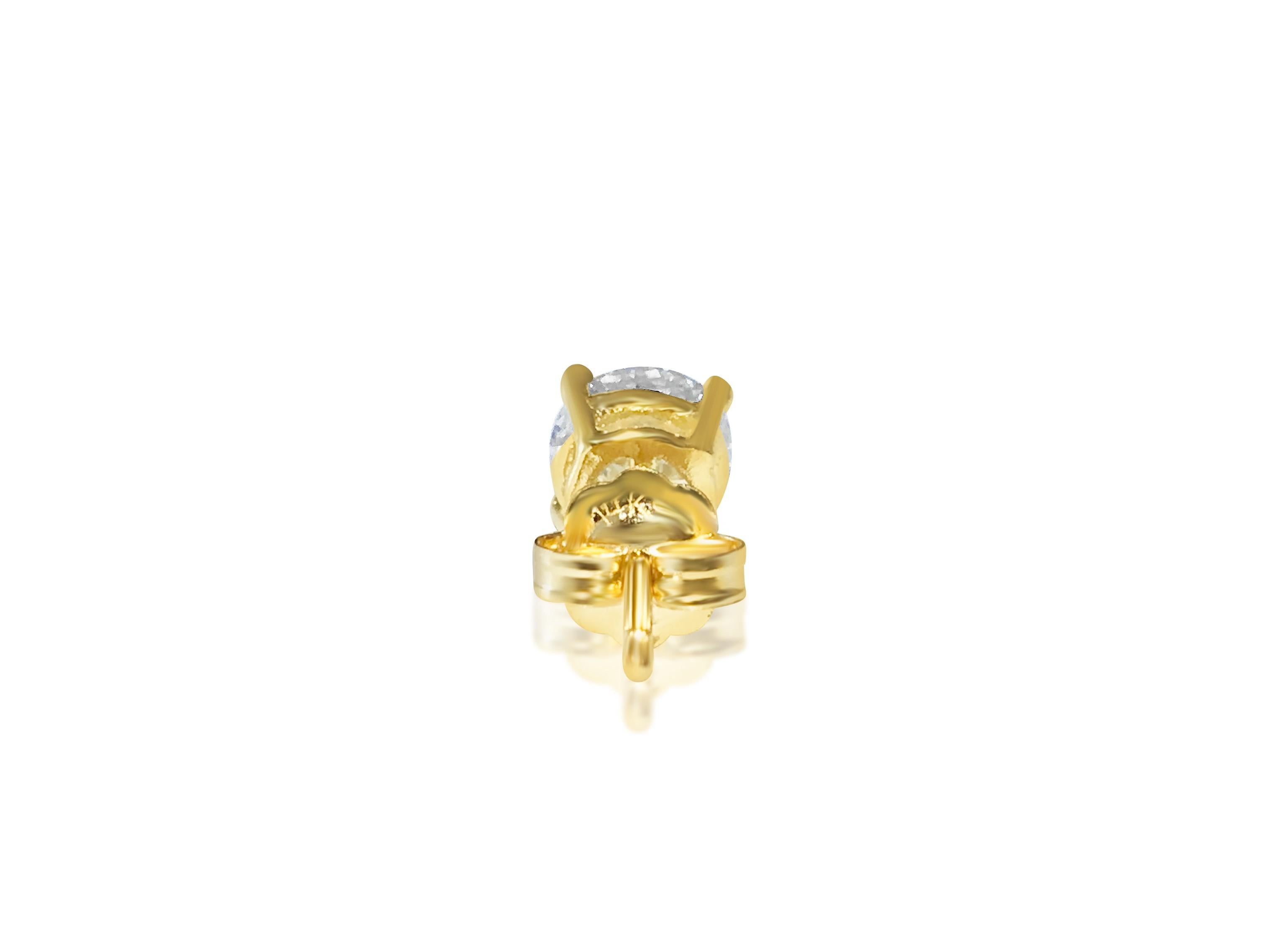 Contemporary 1.20 carat diamond studs in 14kt yellow gold. Custom piece For Sale
