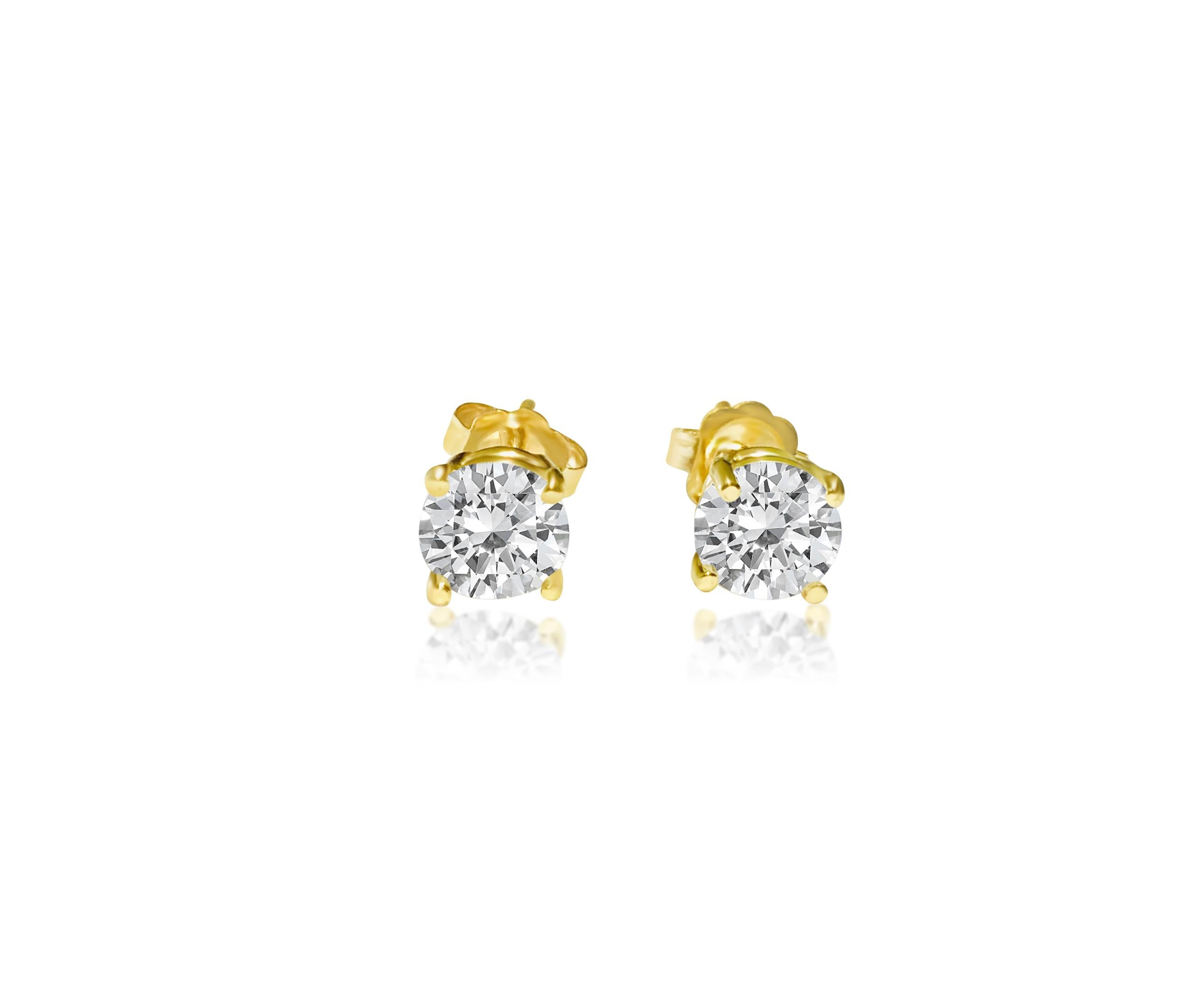 1.20 carat diamond studs in 14kt yellow gold. Custom piece In Excellent Condition For Sale In Miami, FL