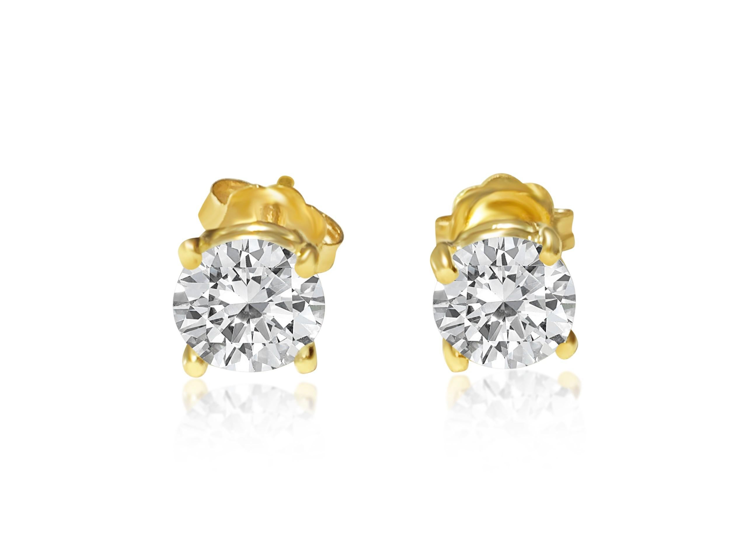 1.20 carat diamond studs in 14kt yellow gold. Custom piece For Sale