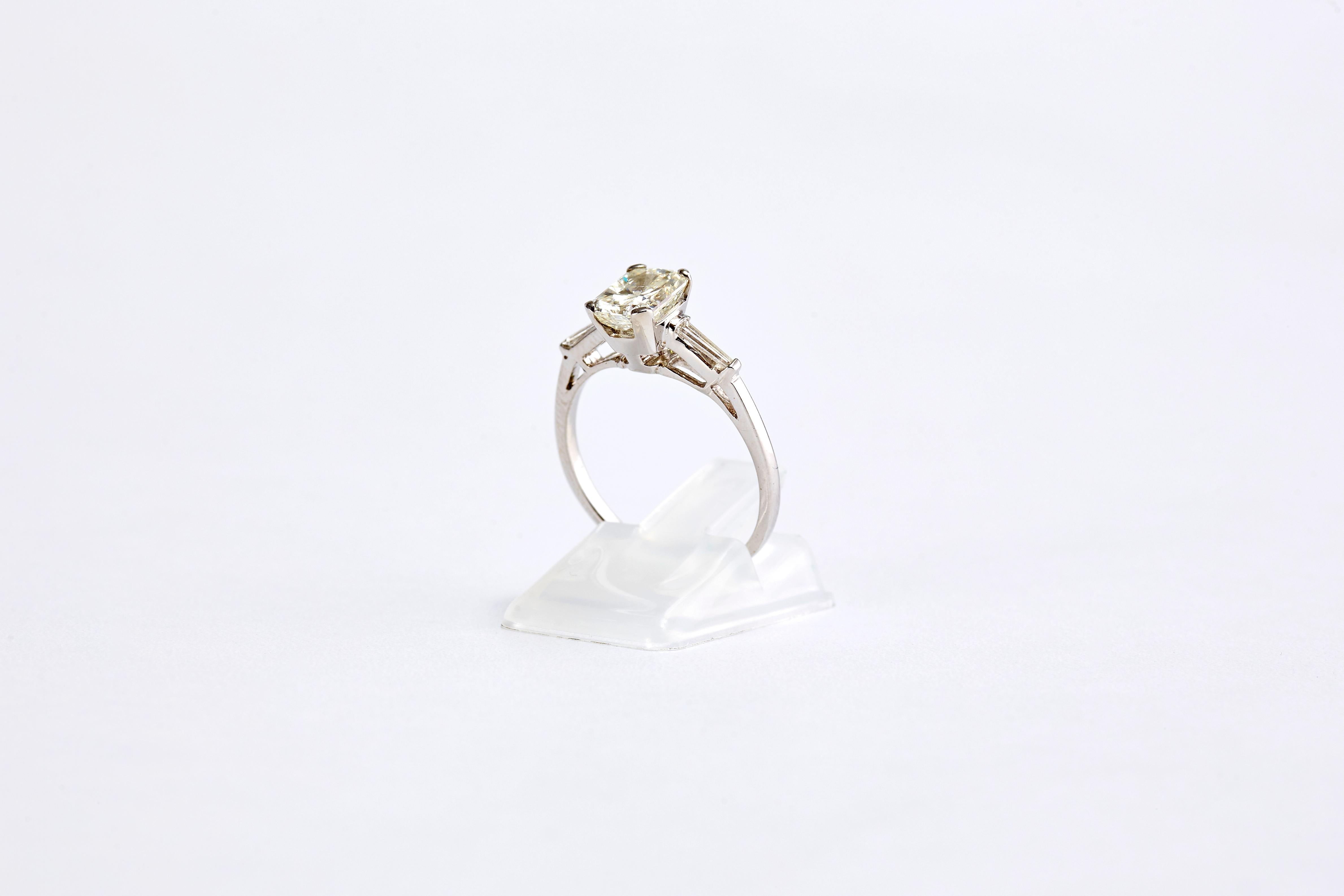 Women's 1.20 Carat Emerald Cut Diamond 3-Stone Engagement Ring