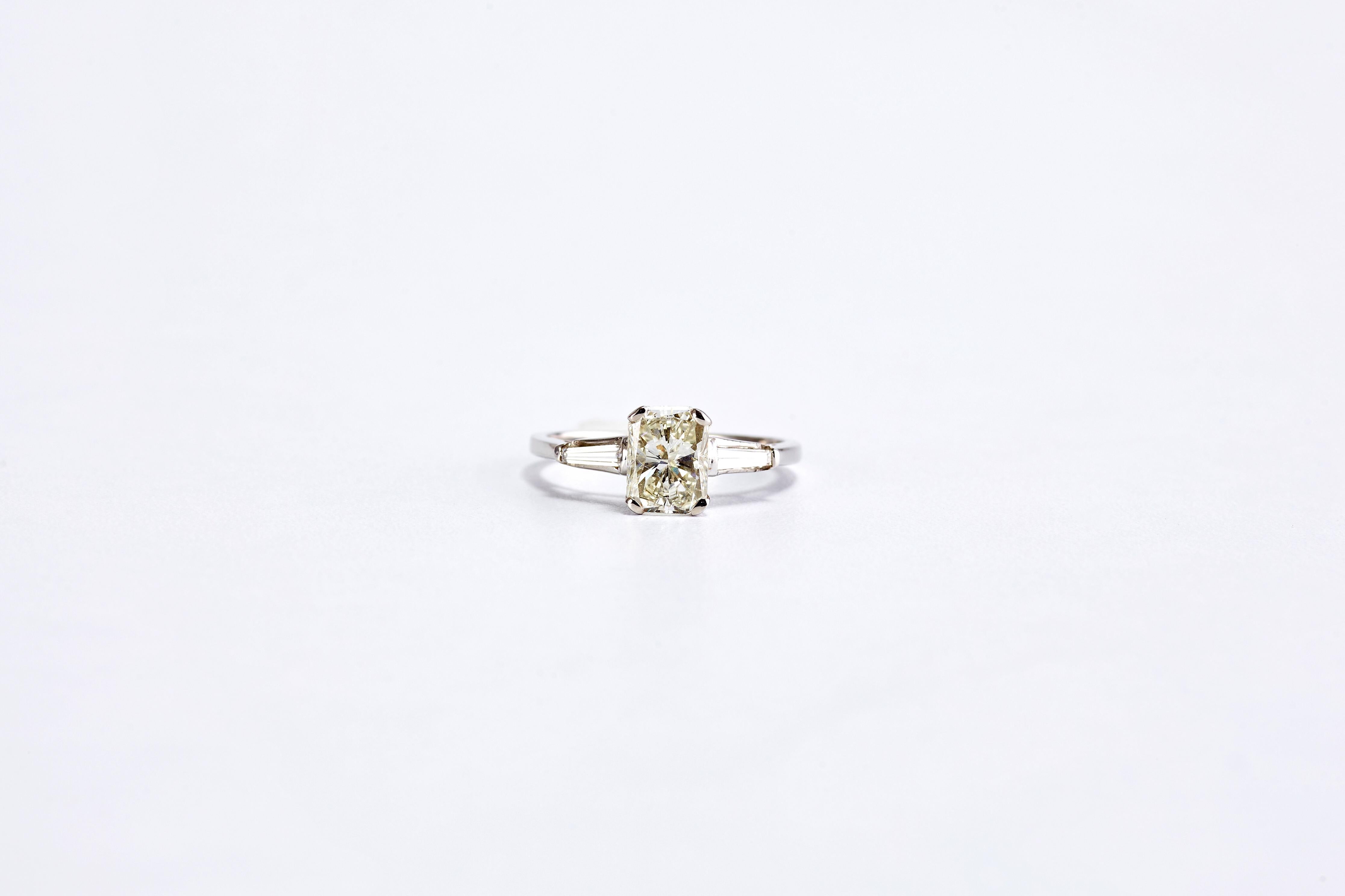 1.20 Carat Emerald Cut Diamond 3-Stone Engagement Ring 1