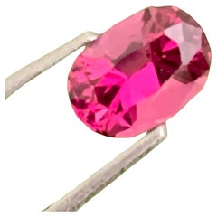 Pierre précieuse rhodolite de forme ovale non sertie de 1,20 carat pour bague 