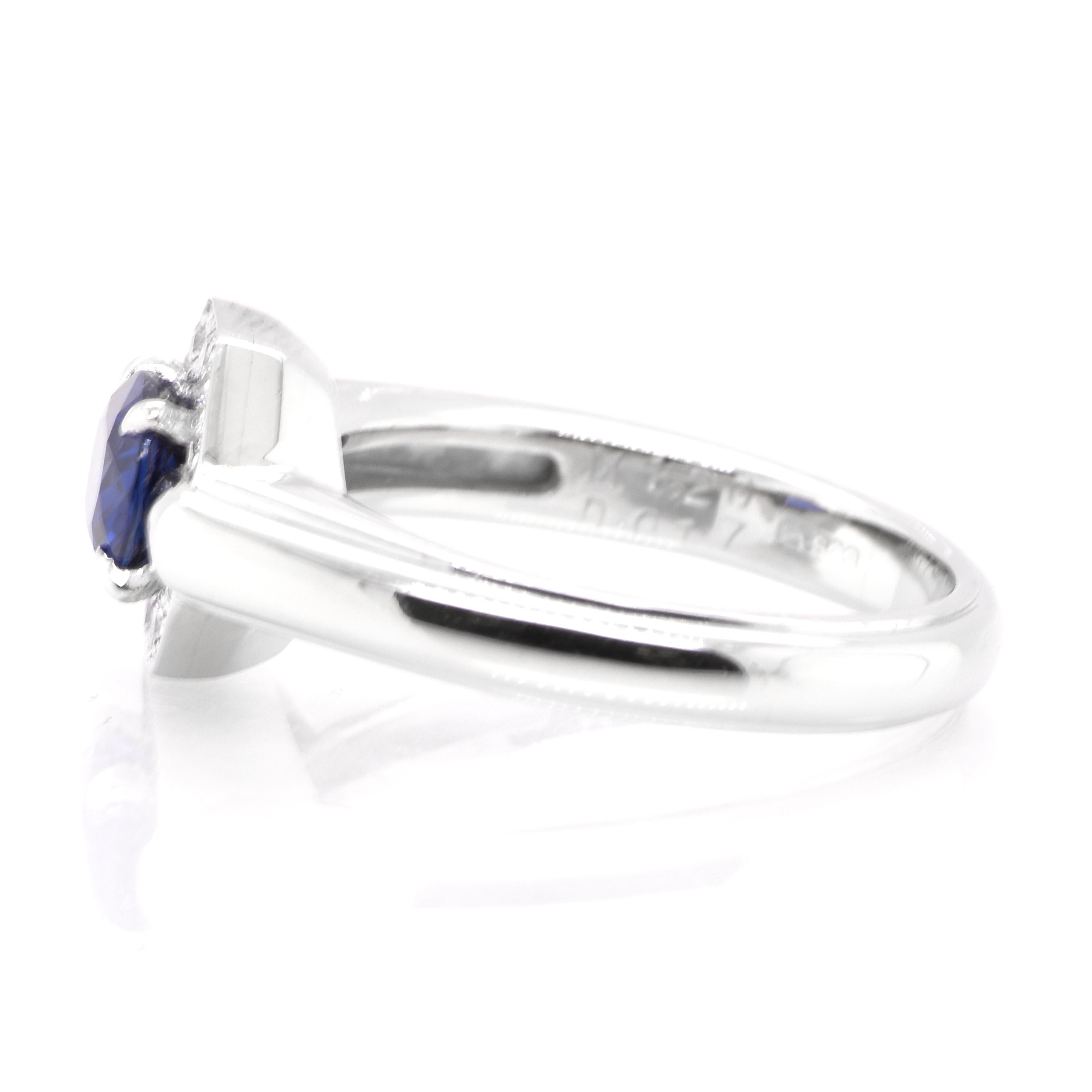 Oval Cut 1.20 Carat Natural Sapphire and Diamond Ring Set in Platinum For Sale