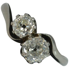 1.20 Carat Old Cut Diamond 18 Carat Gold Toi et Moi Twist Two-Stone Ring