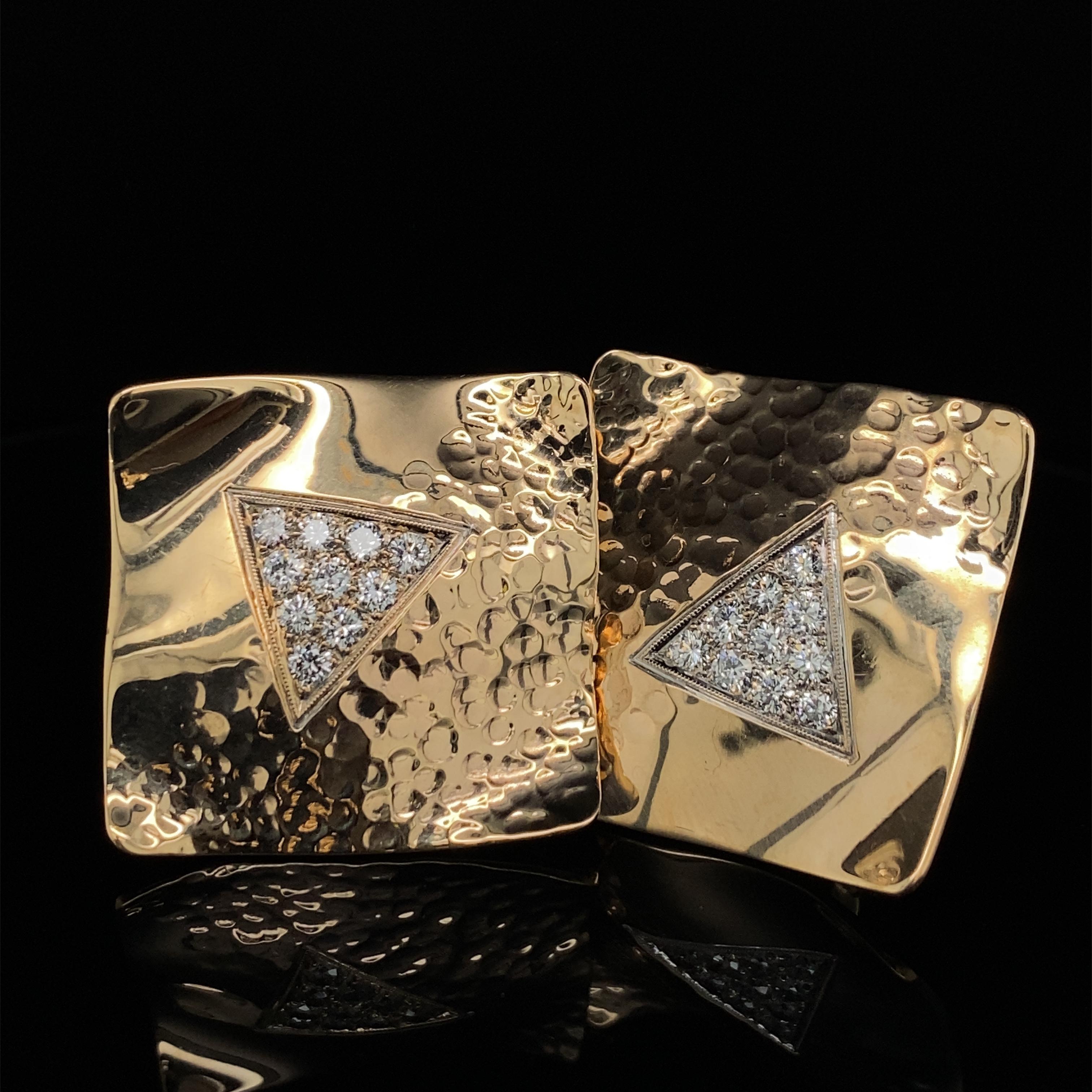 These bold, geometric and unique earrings feature square, slightly wavy plates of pure 14 karat yellow gold with a hammered texture on one side and diamond pavé center triangle.  

Each coin-edged triangle is set with ten round brilliant cut
