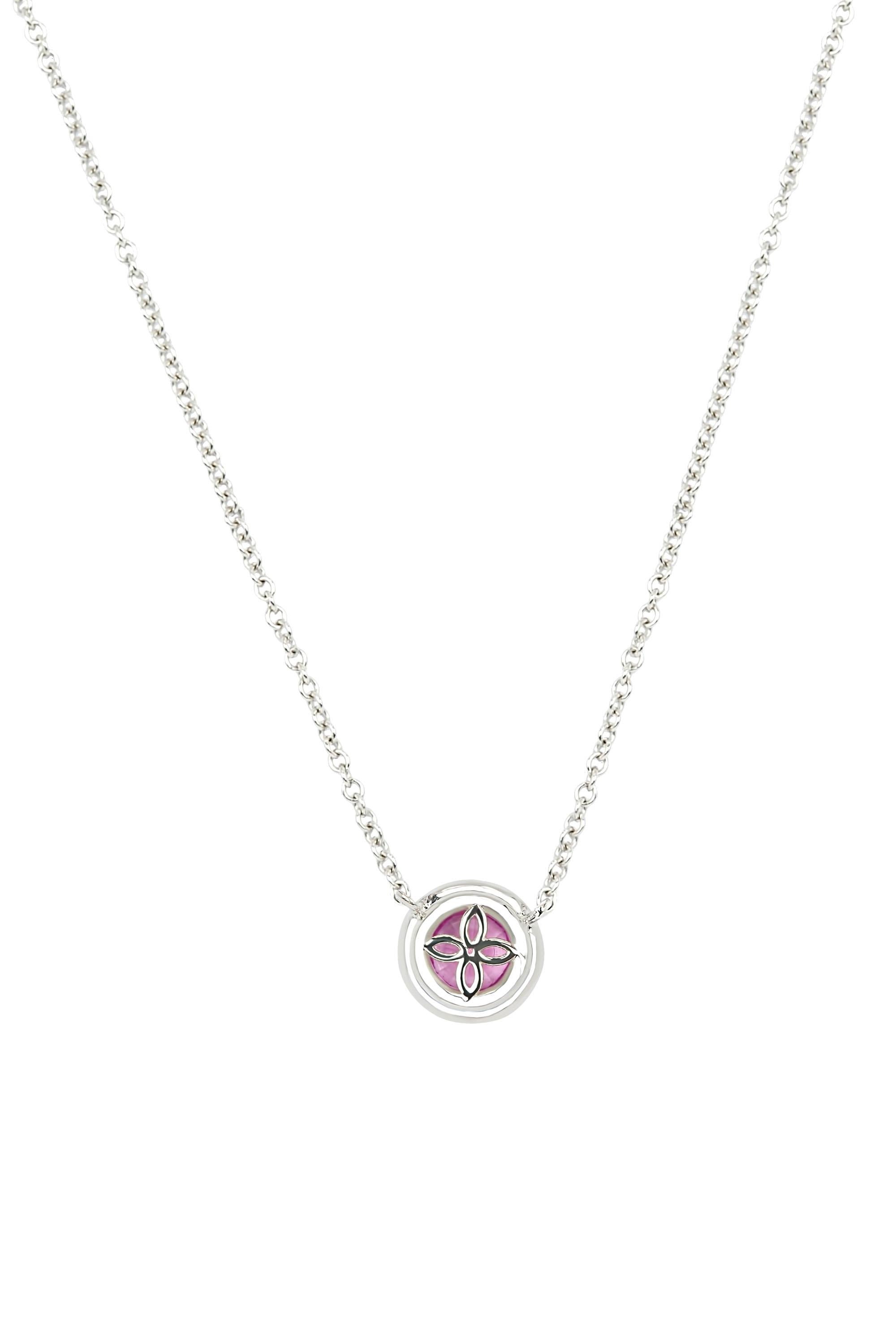 Fabricated in 18-karat white gold this cheerful and delicate necklace features a gracefully suspended bright pink sapphire of approximately 1.20 carats radiating within a frame of round brilliant diamonds. Beautifully detailed and finished. Total