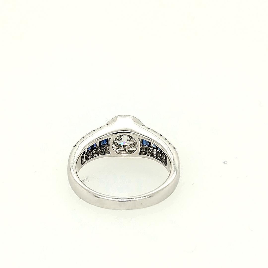 Round Cut 1.20 Carat Round Diamond and Sapphire Ring For Sale