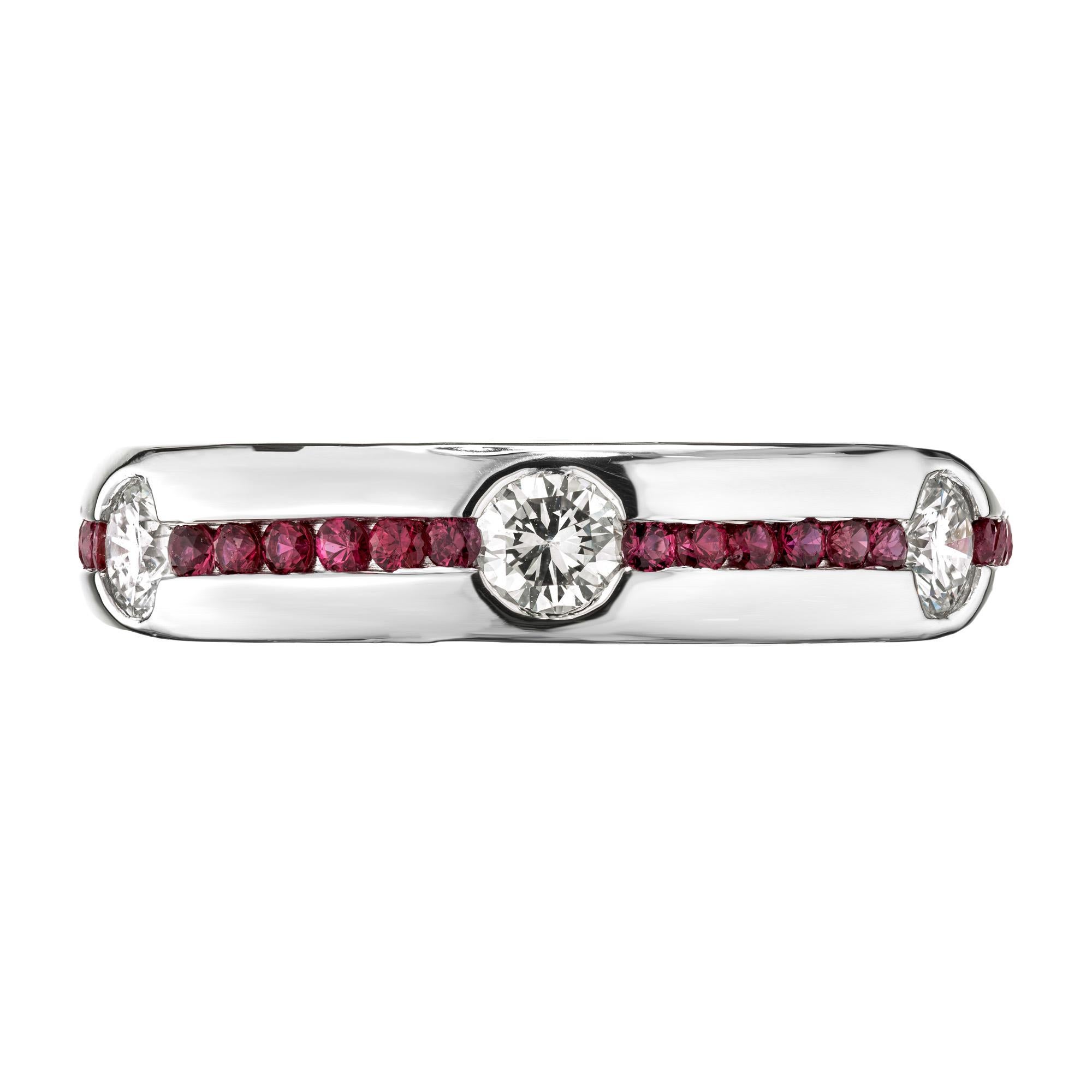 Crafted to captivate, this stunning 1.20ct diamond ruby platinum wedding band ring embodies elegance and sophistication. Set with 6 ideal full cut diamonds with an approximate total weight of .60cts, the diamonds go around the band, separated by a