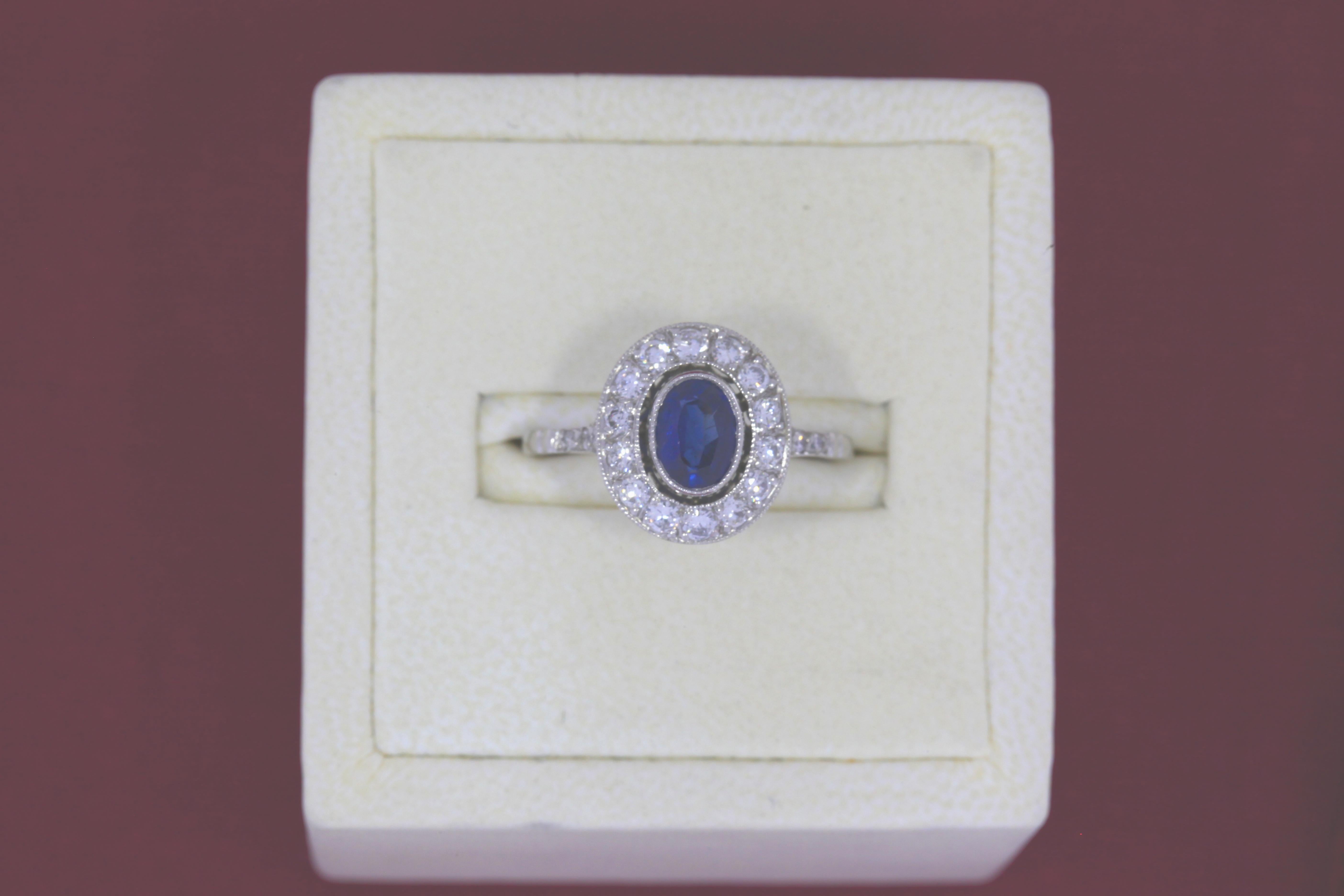 Oval Cut 1.20 Carat Sapphire and Diamond Platinum Ring For Sale