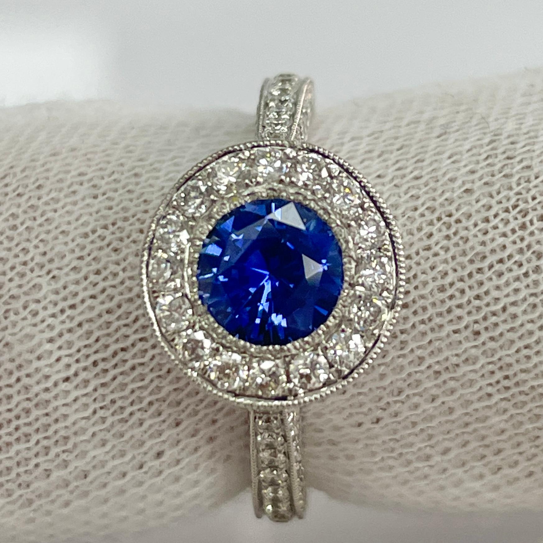 This ring has a soft blue yet very fully saturated and lively sapphire. This ring is very elegant with 18K white gold and 1.05 carats of brilliant white diamonds.