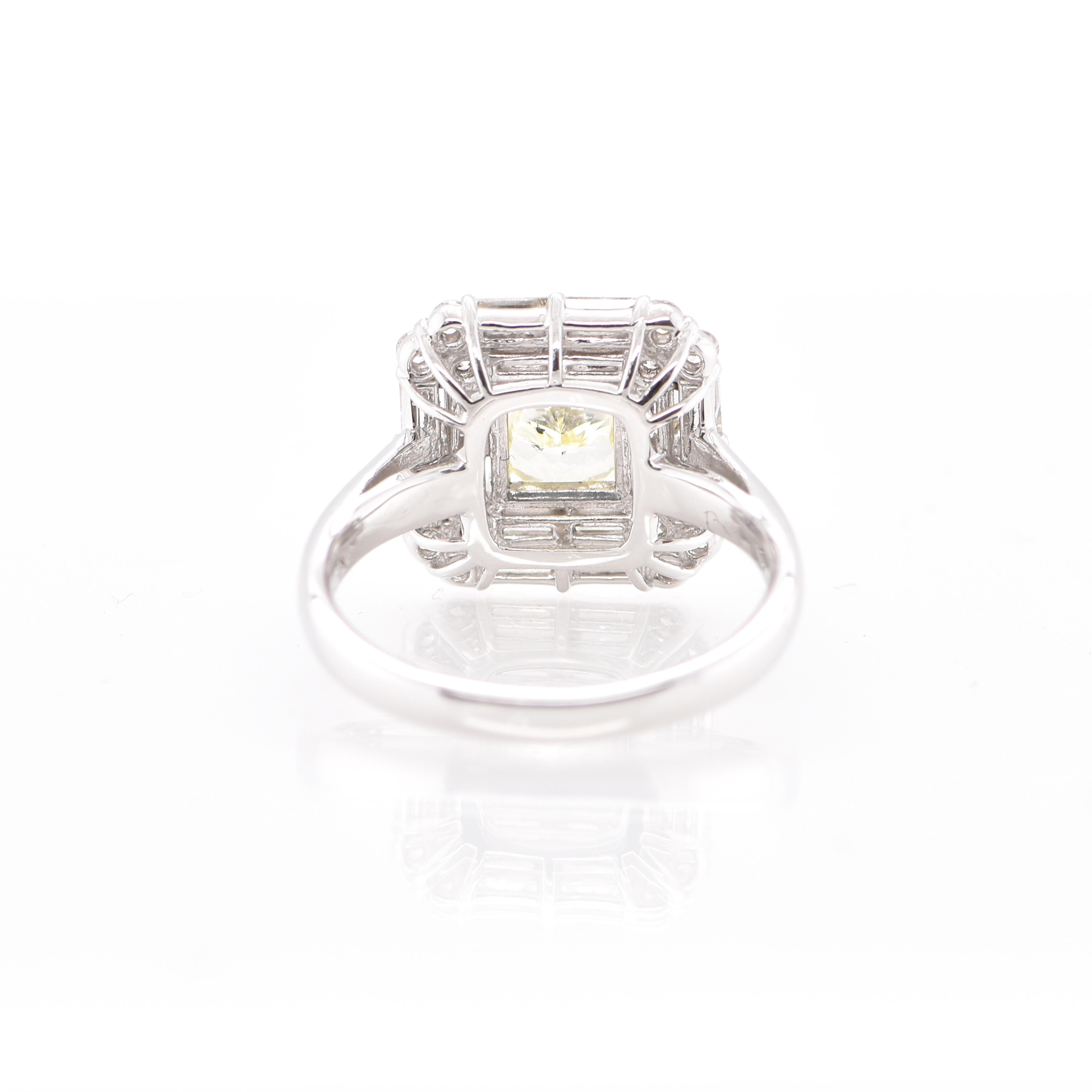 An gorgeous Engagement Cluster Ring featuring a SI-1 Light Yellow Diamond and 0.80 Carats of White Diamond Accents set in Platinum. Diamonds have been adorned and cherished throughout human history and date back to thousands of years. They are rated