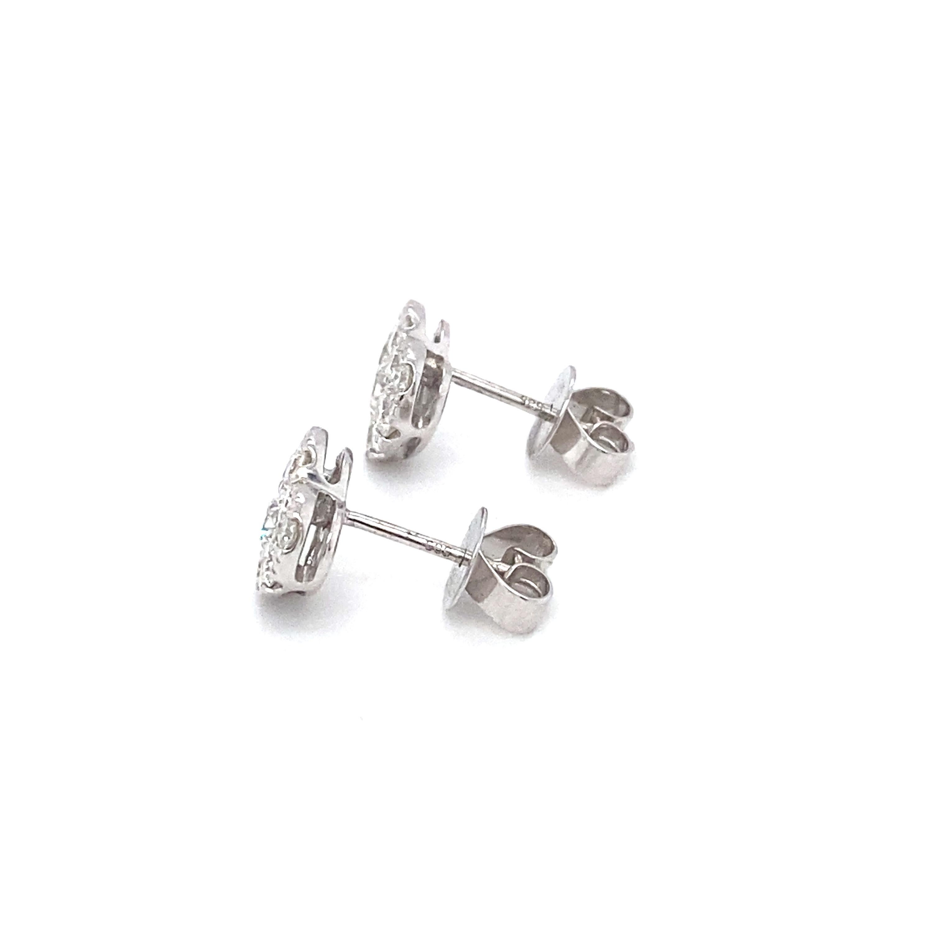 Modern 1.20 Carat Total Diamond Heart Earrings in 14 Karat White Gold For Sale