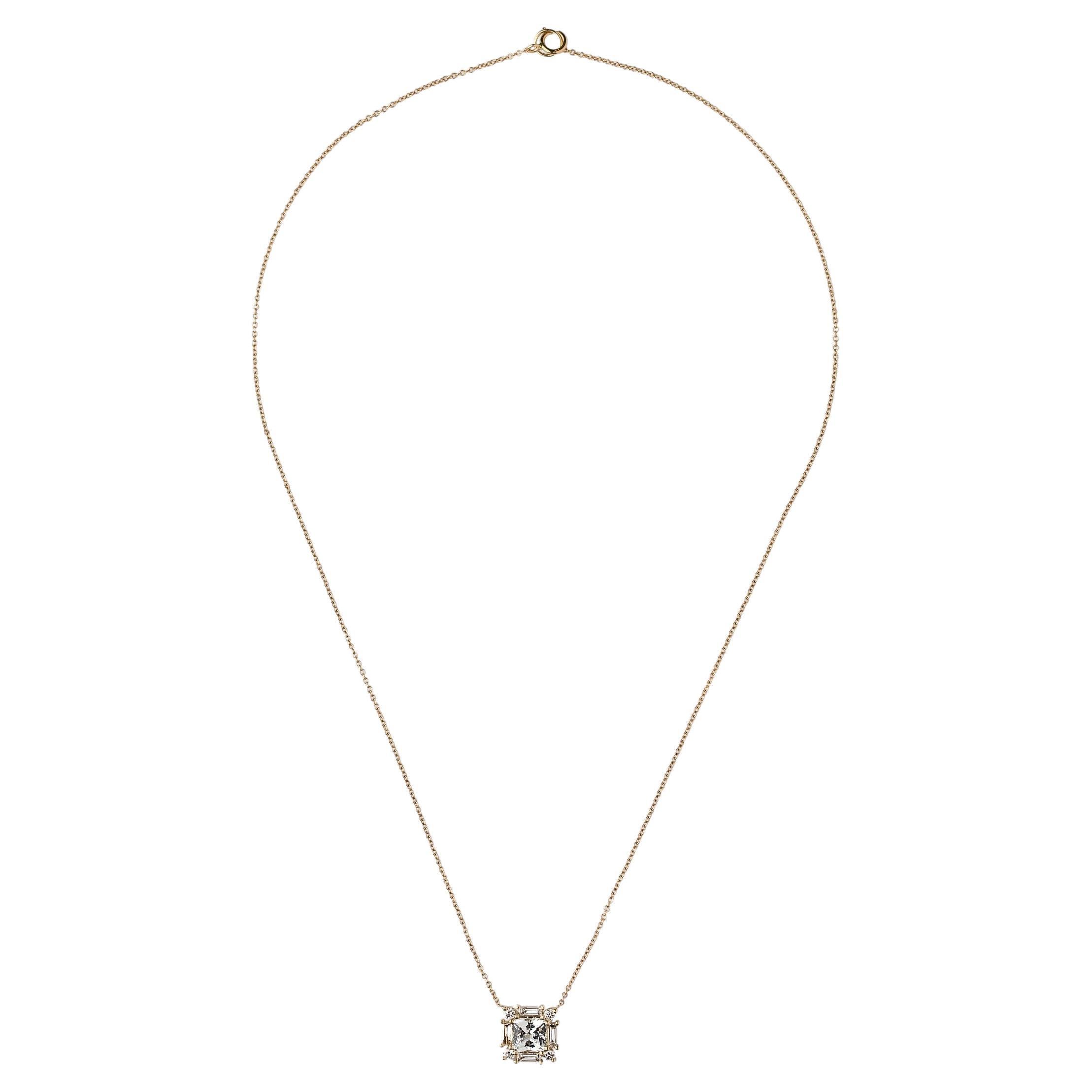 Embark on a journey of refined elegance with the 14K Yellow Gold White Sapphire Pendant, a radiant masterpiece that captures the essence of celestial beauty. At its core, a majestic 6.3mm square radiant-cut white sapphire, boasting 1.20 carats of