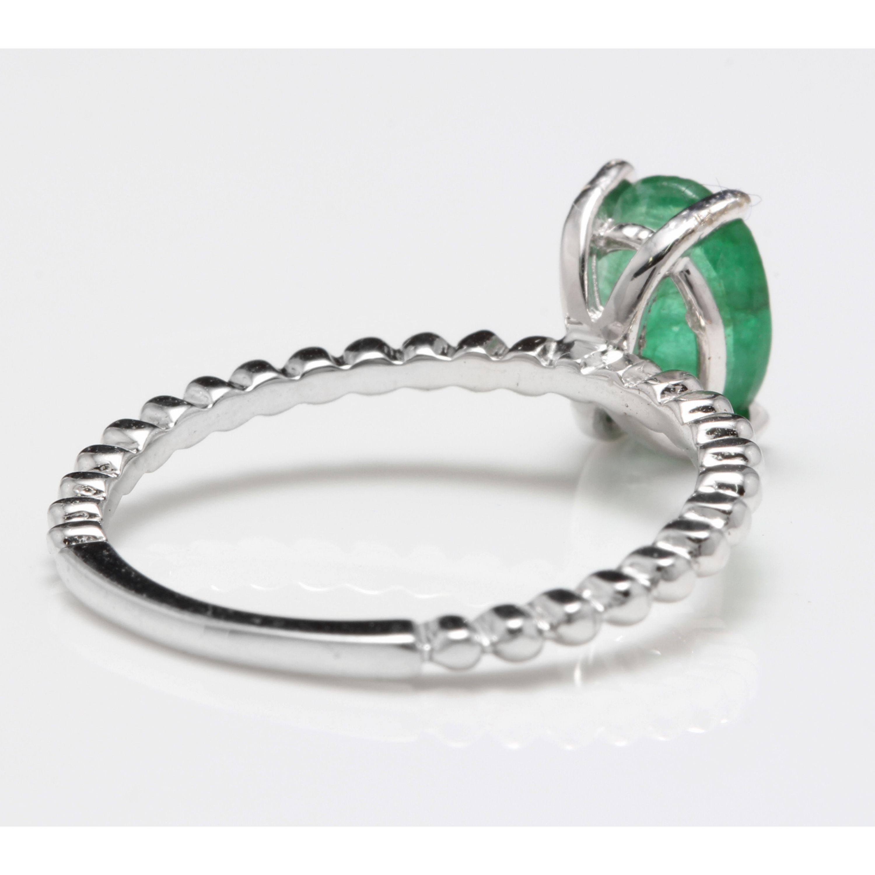 Oval Cut 1.20 Carat Exquisite Natural Emerald 14 Karat Solid White Gold Ring For Sale